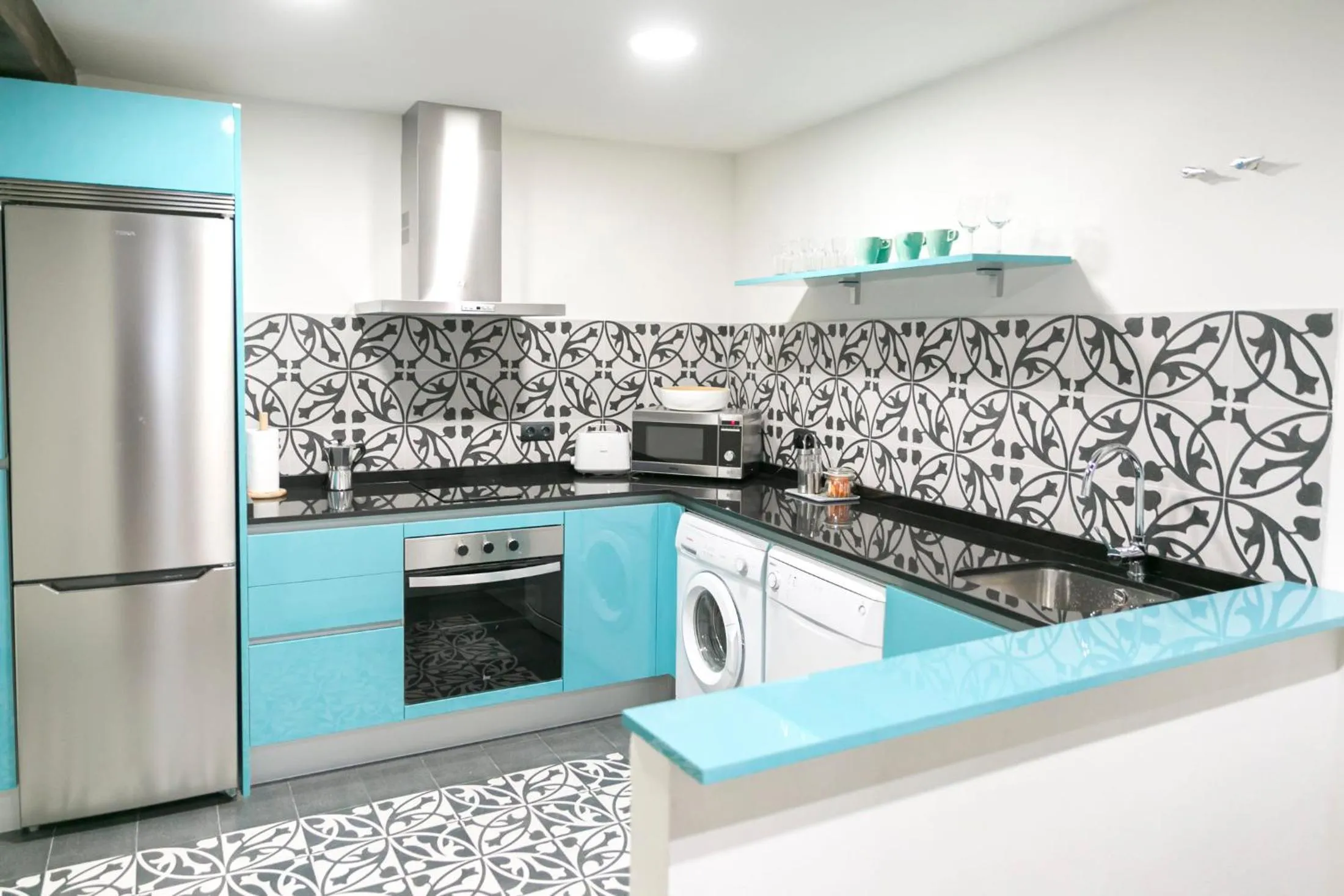 Kitchen or kitchenette in Aqua Apartments Málaga