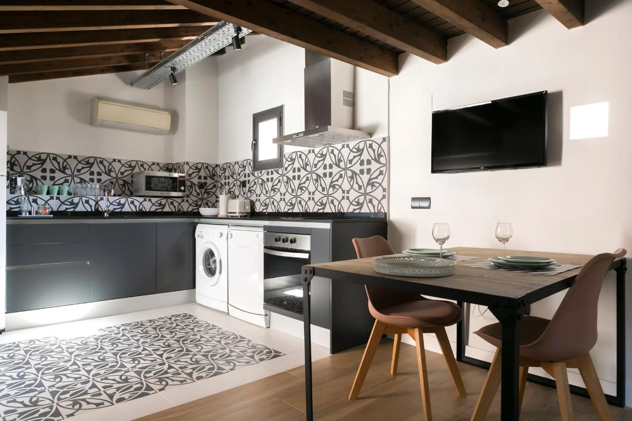 Kitchen or kitchenette in Aqua Apartments Málaga