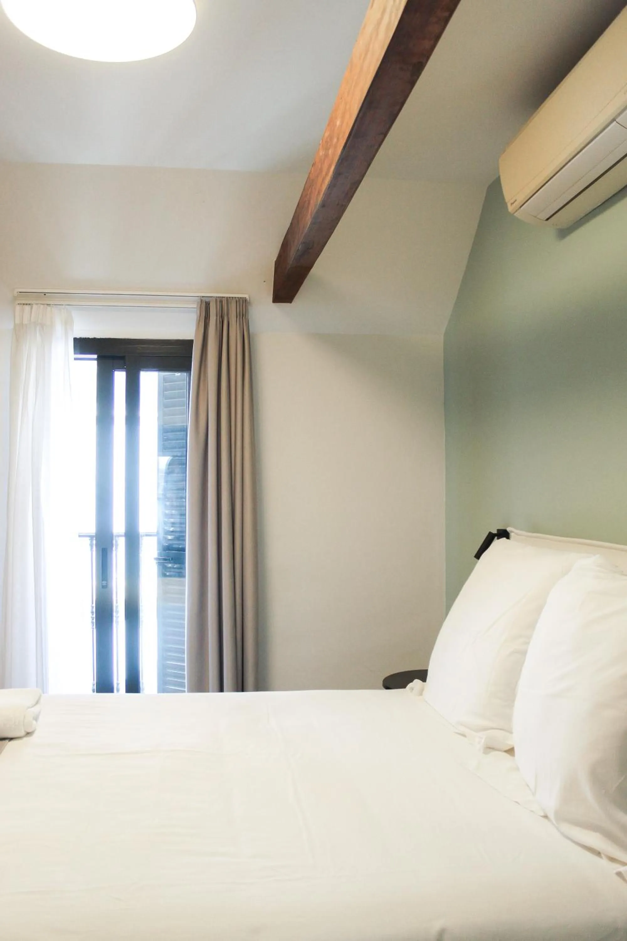 Bed in Aqua Apartments Málaga