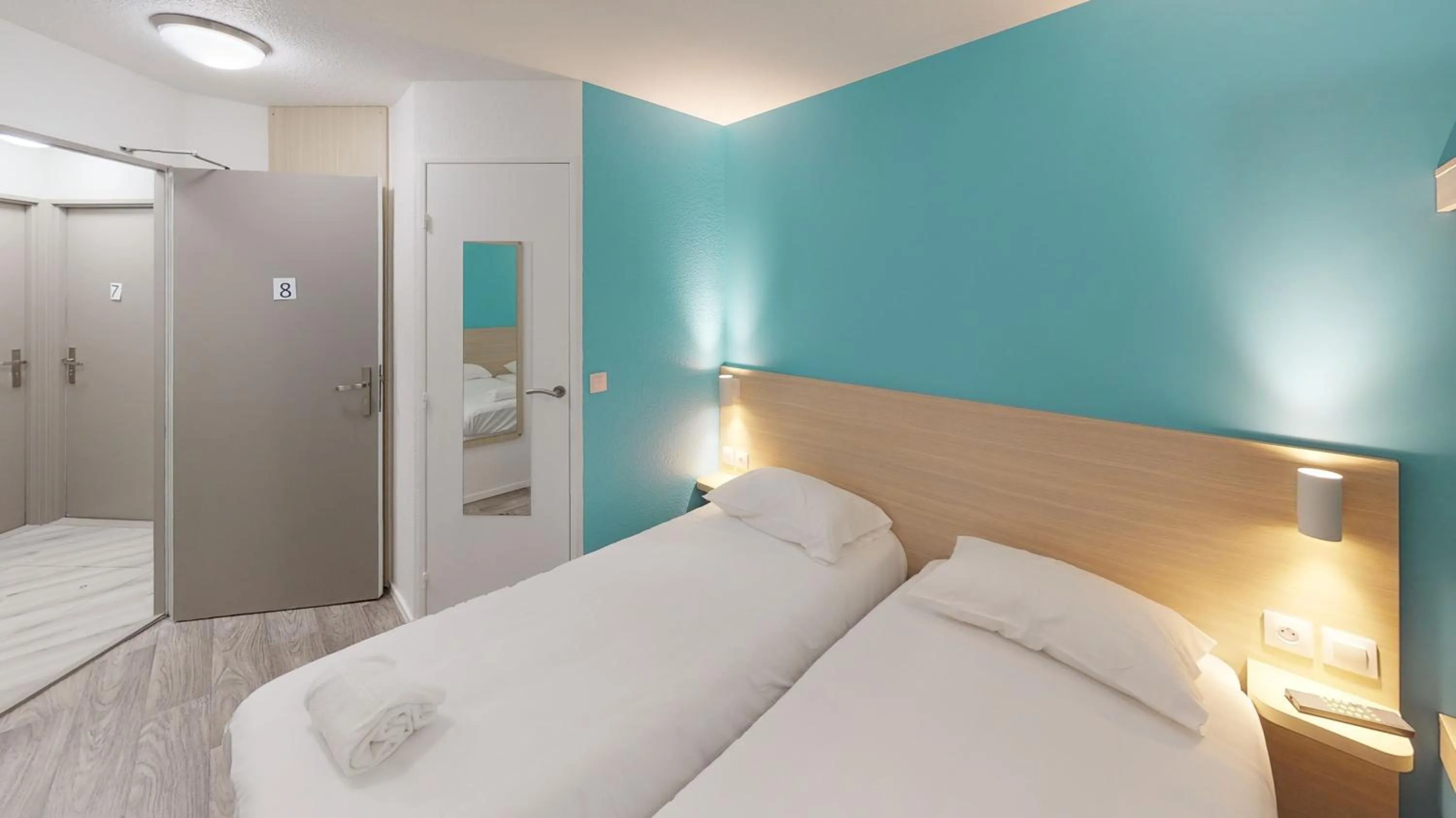 Bedroom, Bed in Hôtel du stade ex Kyriad Direct Lille Est Stade Pierre Mauroy