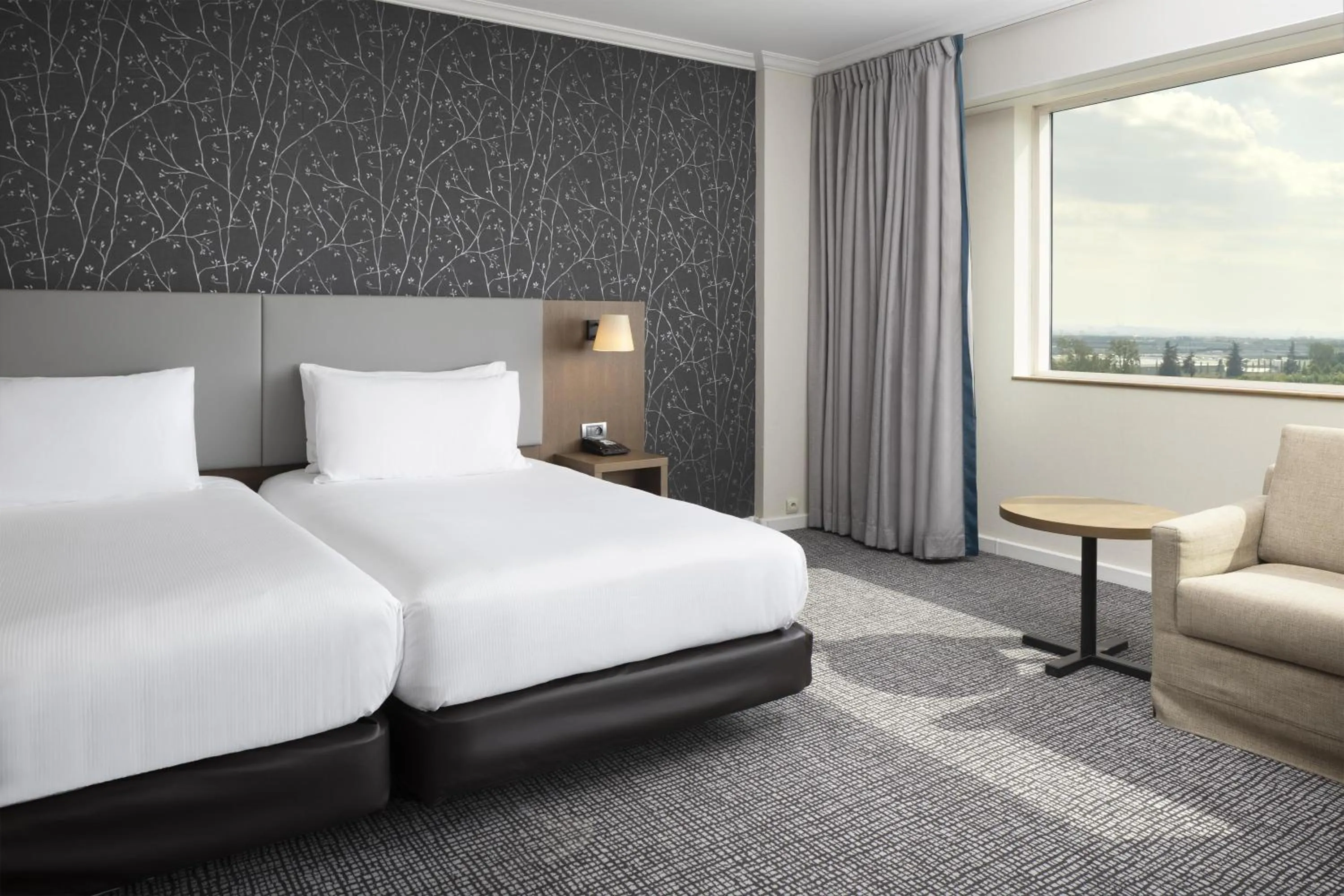 Bed in Hilton Paris Charles De Gaulle Airport