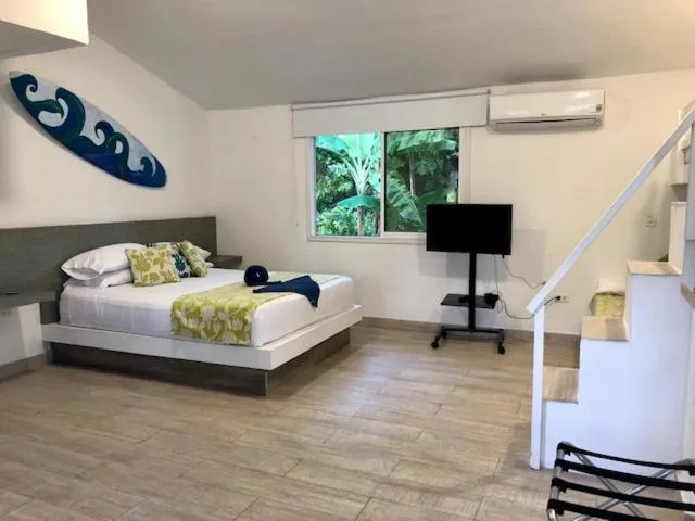 Photo of the whole room, Bed in Casa de las Flores tropical