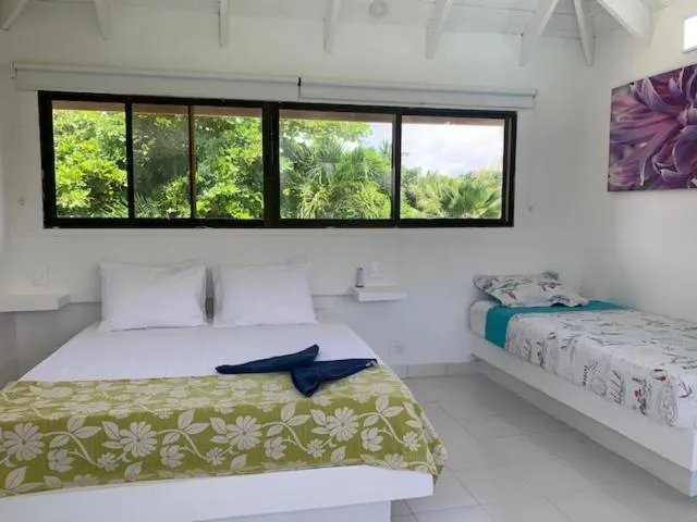 Photo of the whole room, Bed in Casa de las Flores tropical