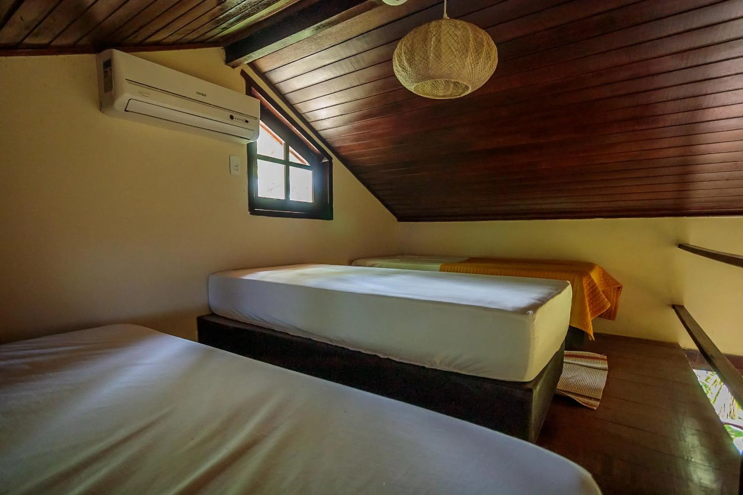 Bed in Pousada Lagamar