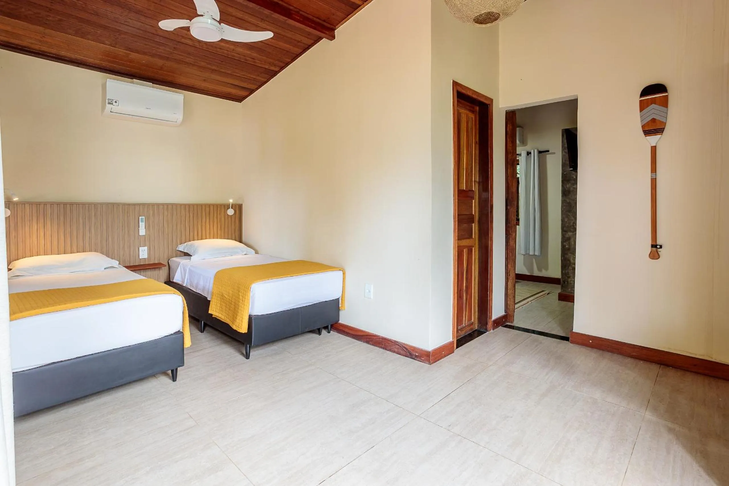 Bed in Pousada Lagamar