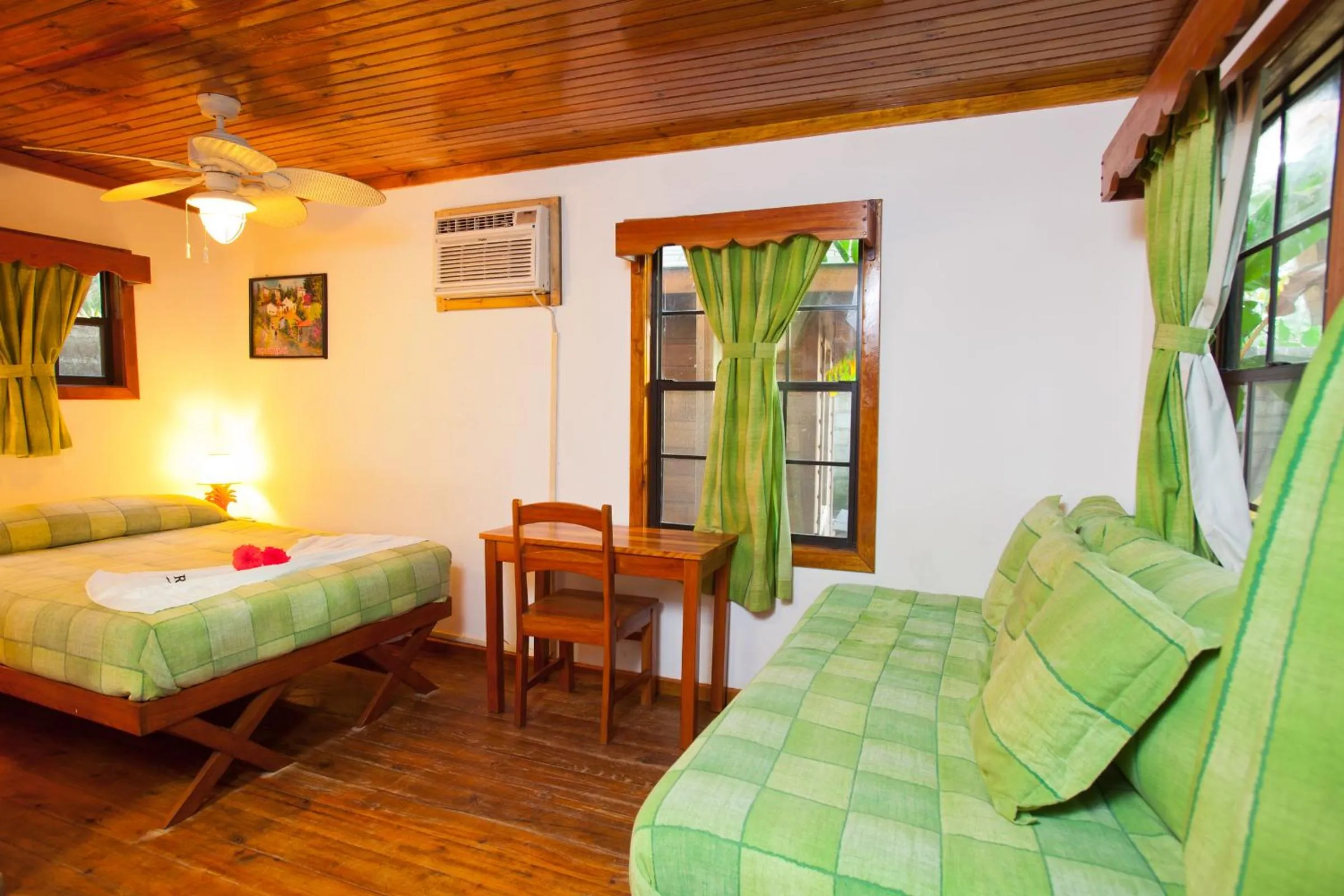 Photo of the whole room, Bed in Las Rocas Resort and Dive Center