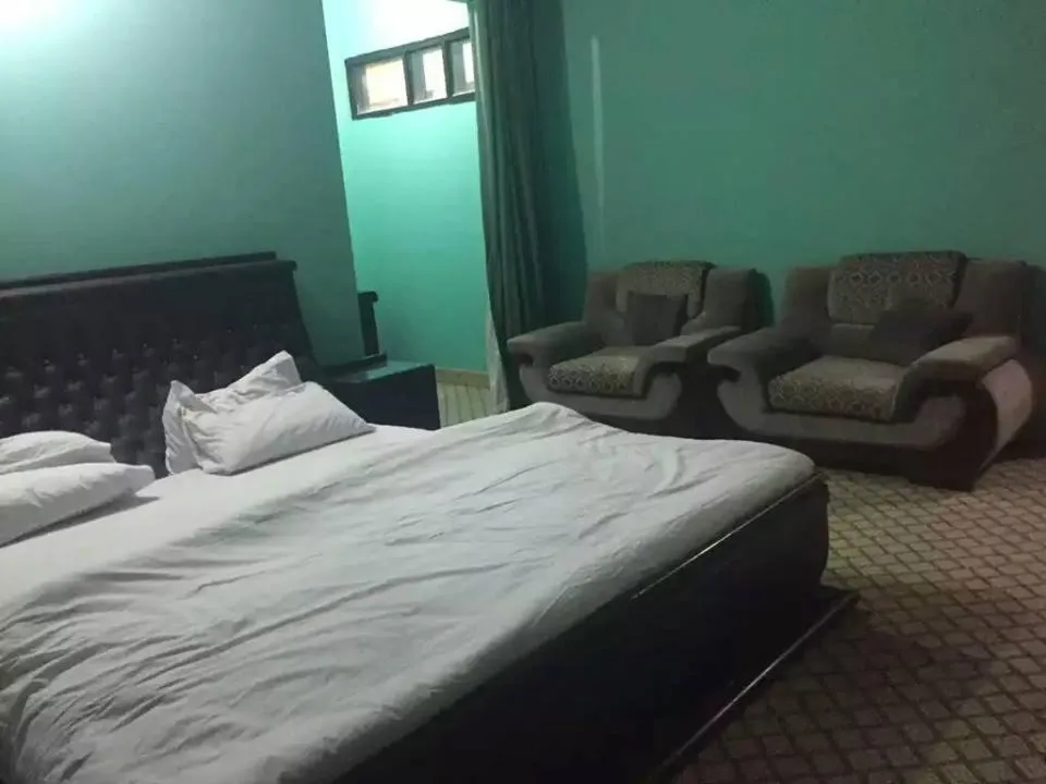 Bed in Flora Inn Hotel Naran