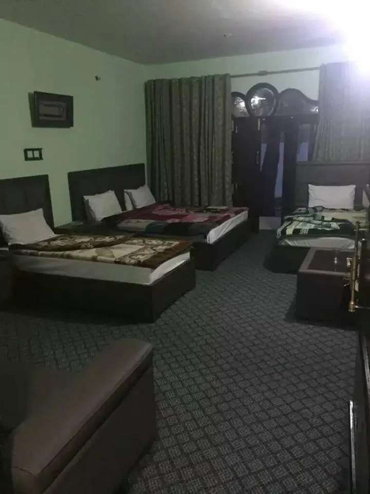 Bed in Flora Inn Hotel Naran