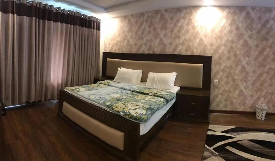 Bed in Flora Inn Hotel Naran