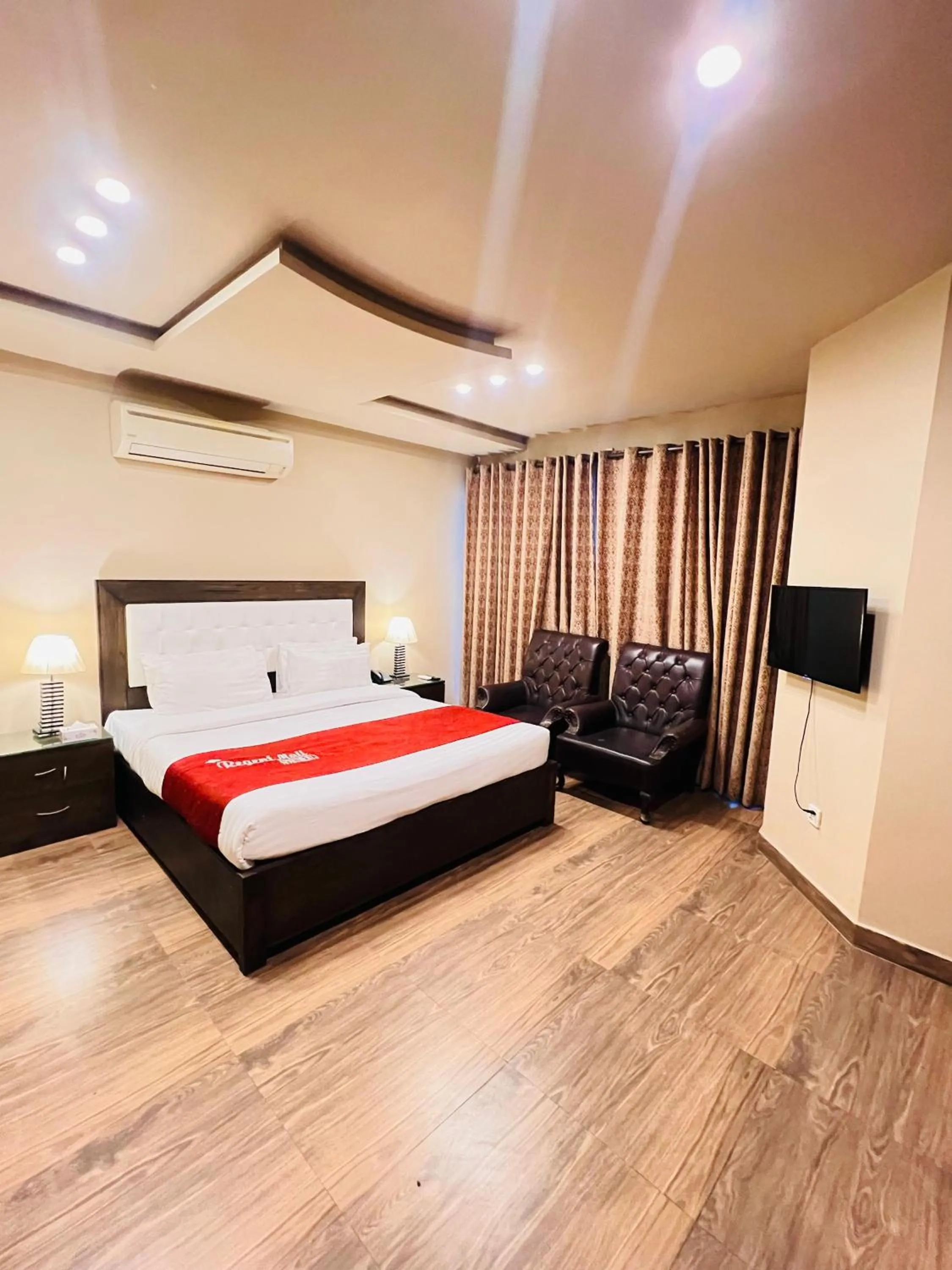 Bedroom, Bed in Grand Regent Hotel and Suites