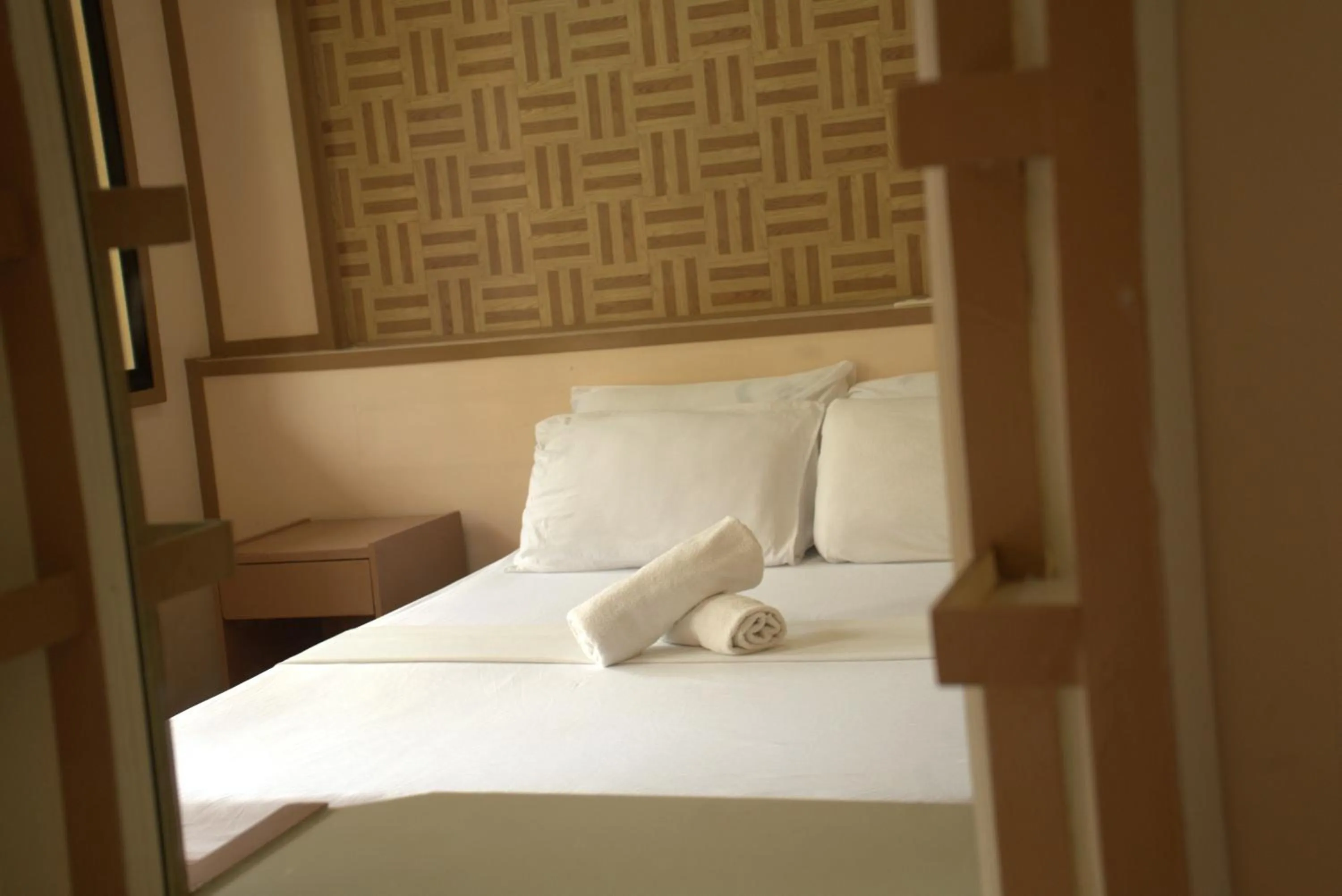 Bed in Stefanie Grace Inn