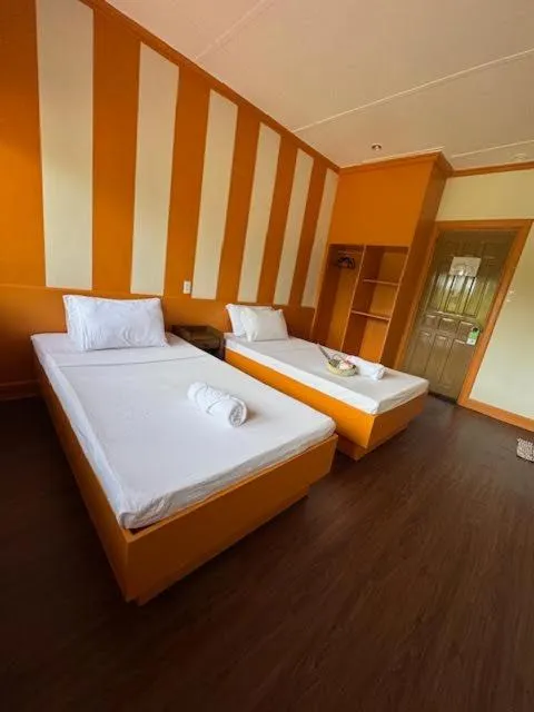 Bed in Stefanie Grace Inn