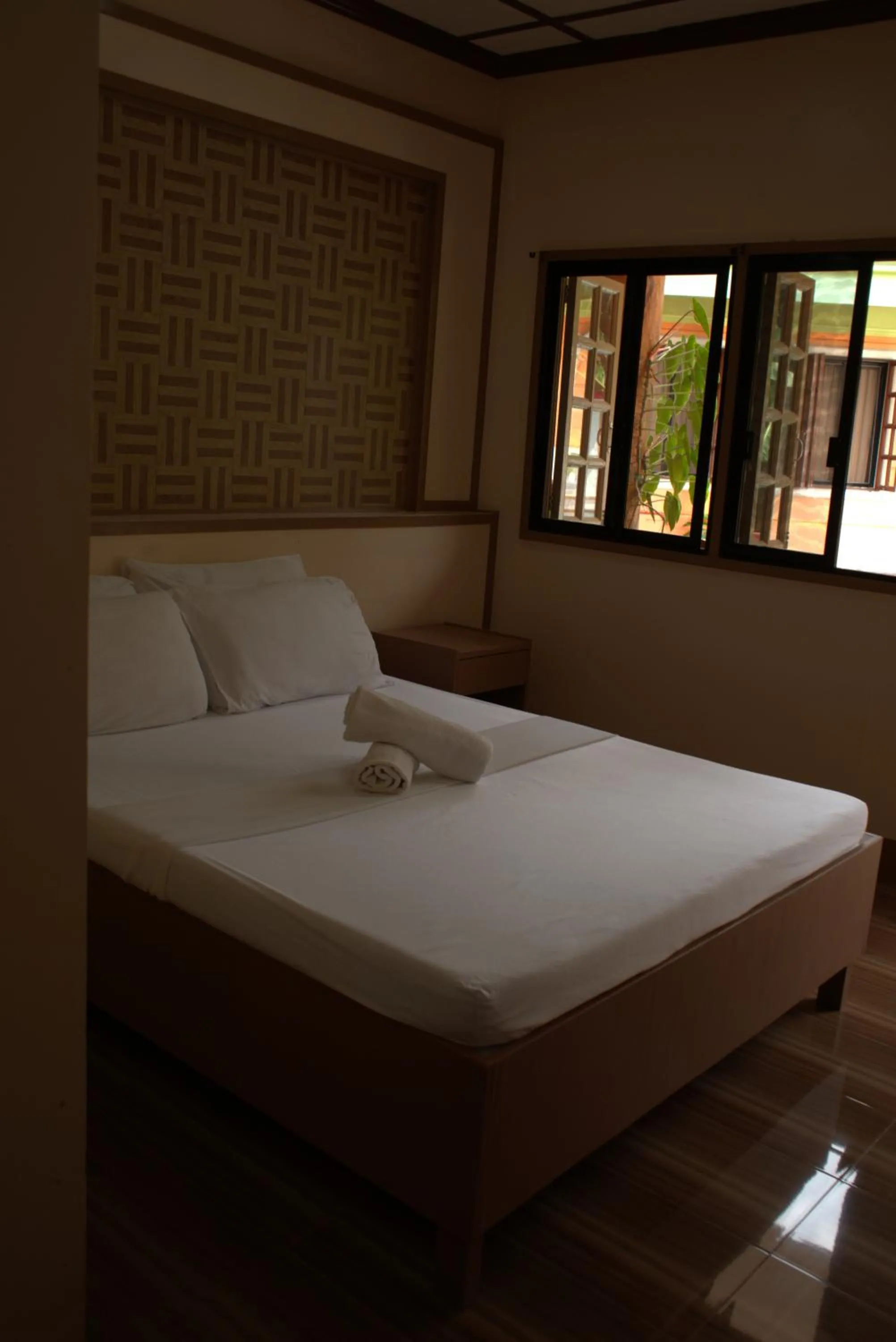 Bed in Stefanie Grace Inn