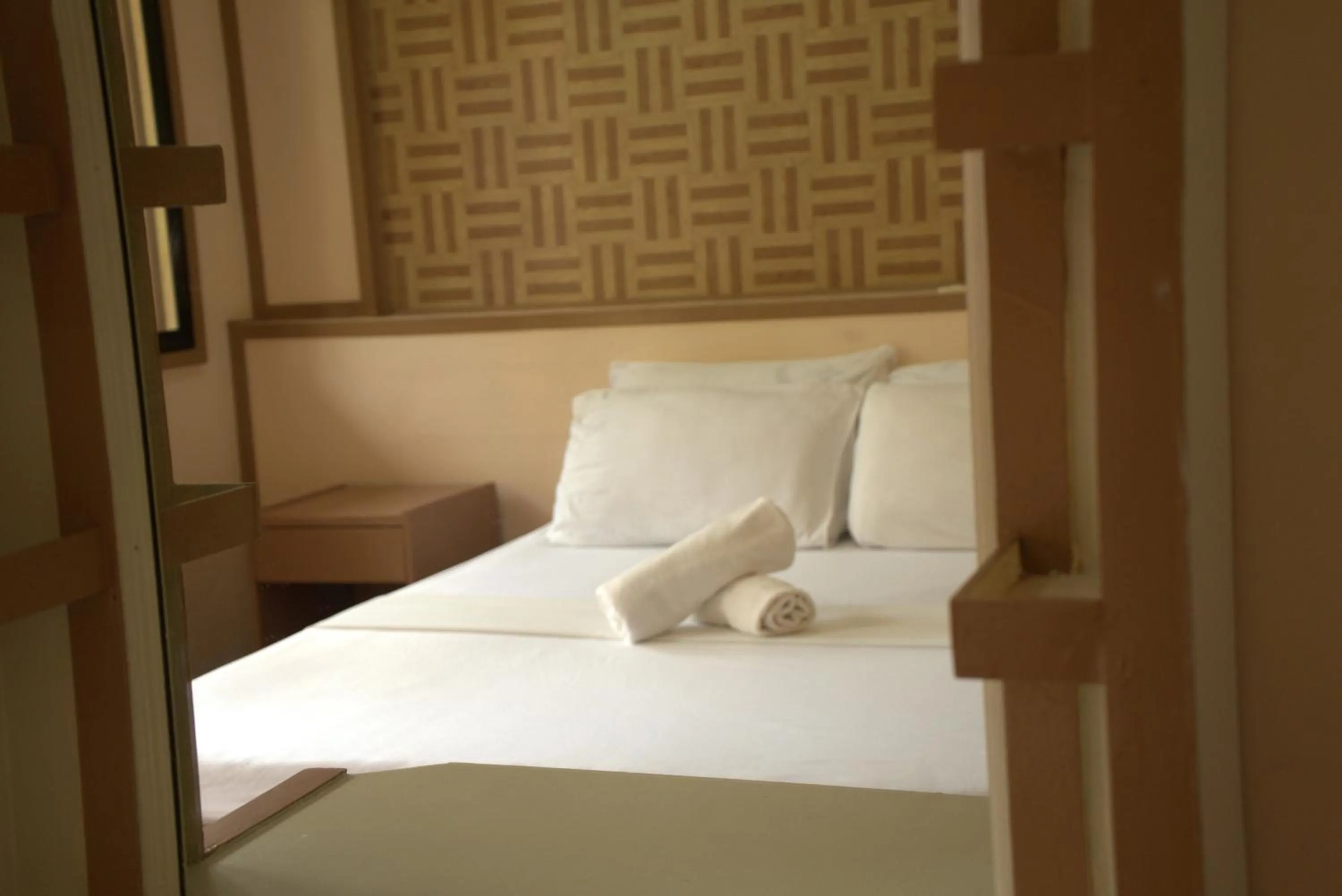 Bed in Stefanie Grace Inn