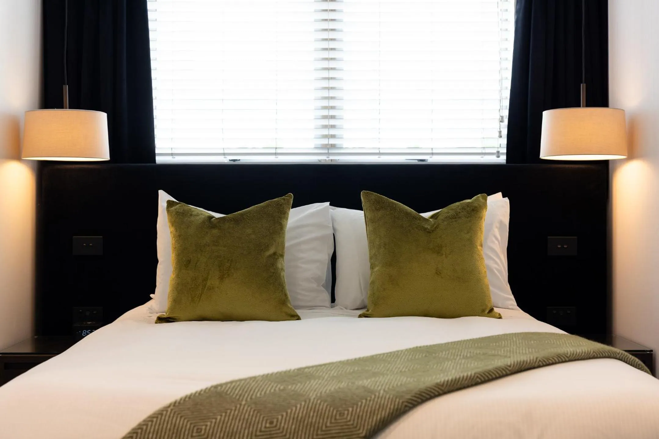 Bed in Regent of Rotorua Boutique Hotel