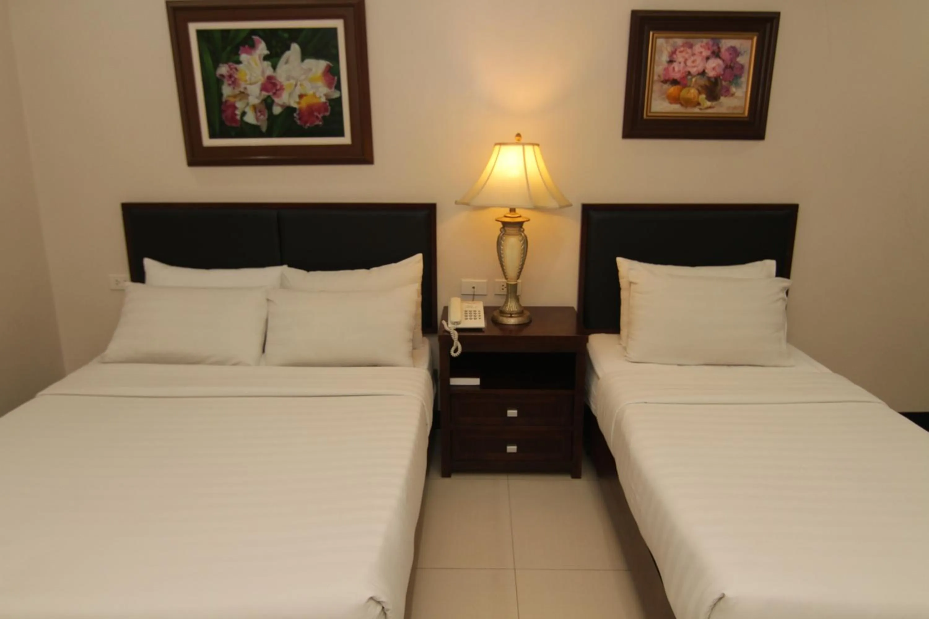 Bed in Main Hotel & Suites