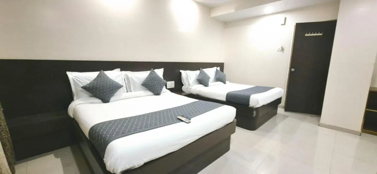 Bed in Hotel Krishna Sai Kutir