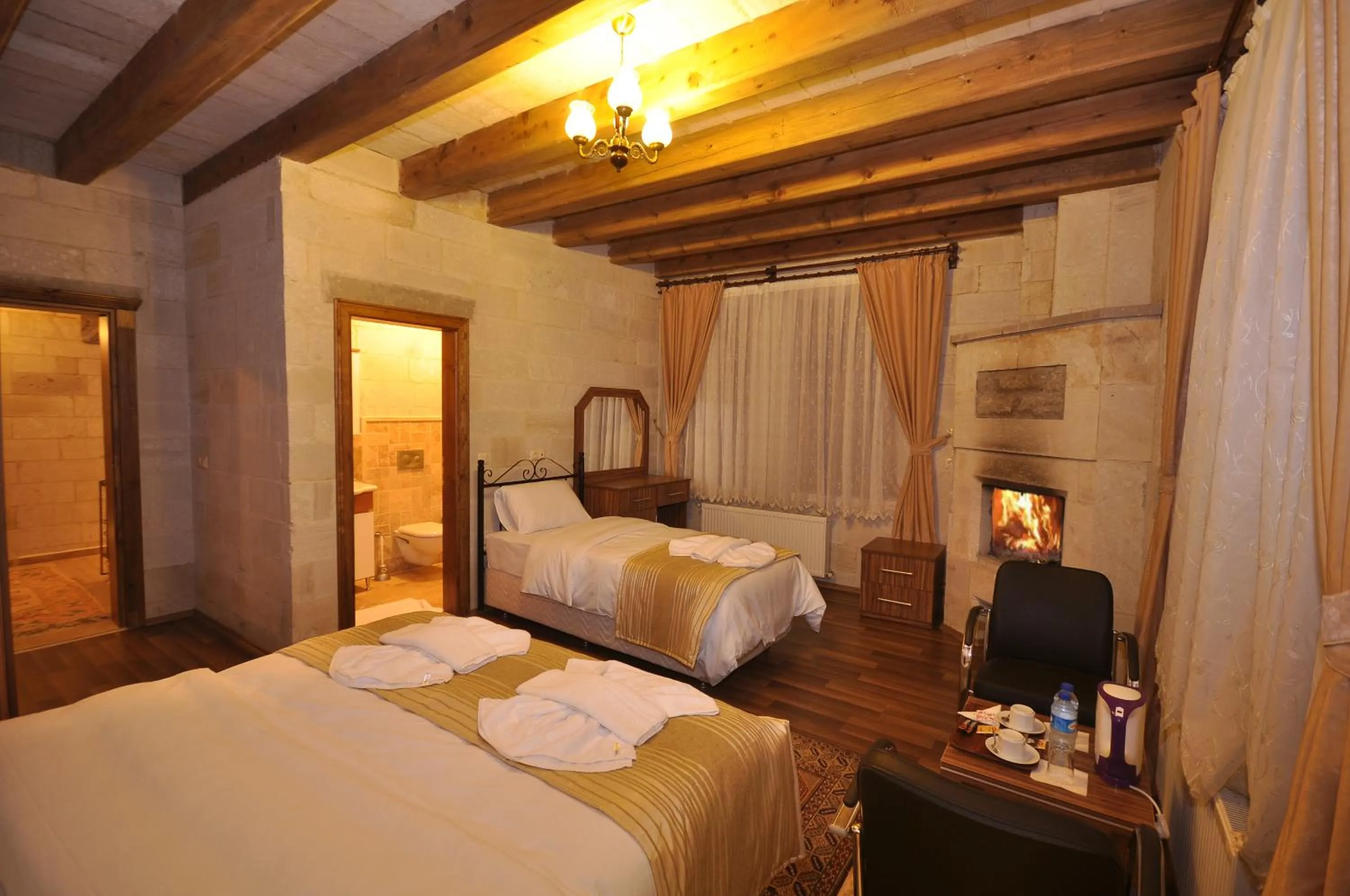 Photo of the whole room, Bed in Cappadocia Stone Palace