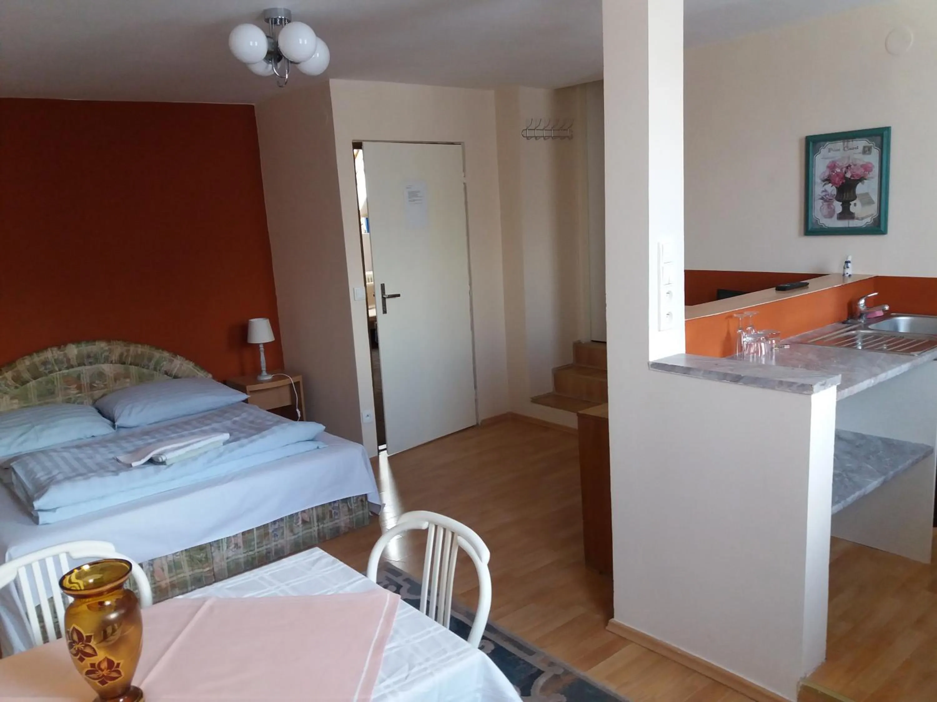 Kitchen or kitchenette, Bed in Apartmány Sedmikráska