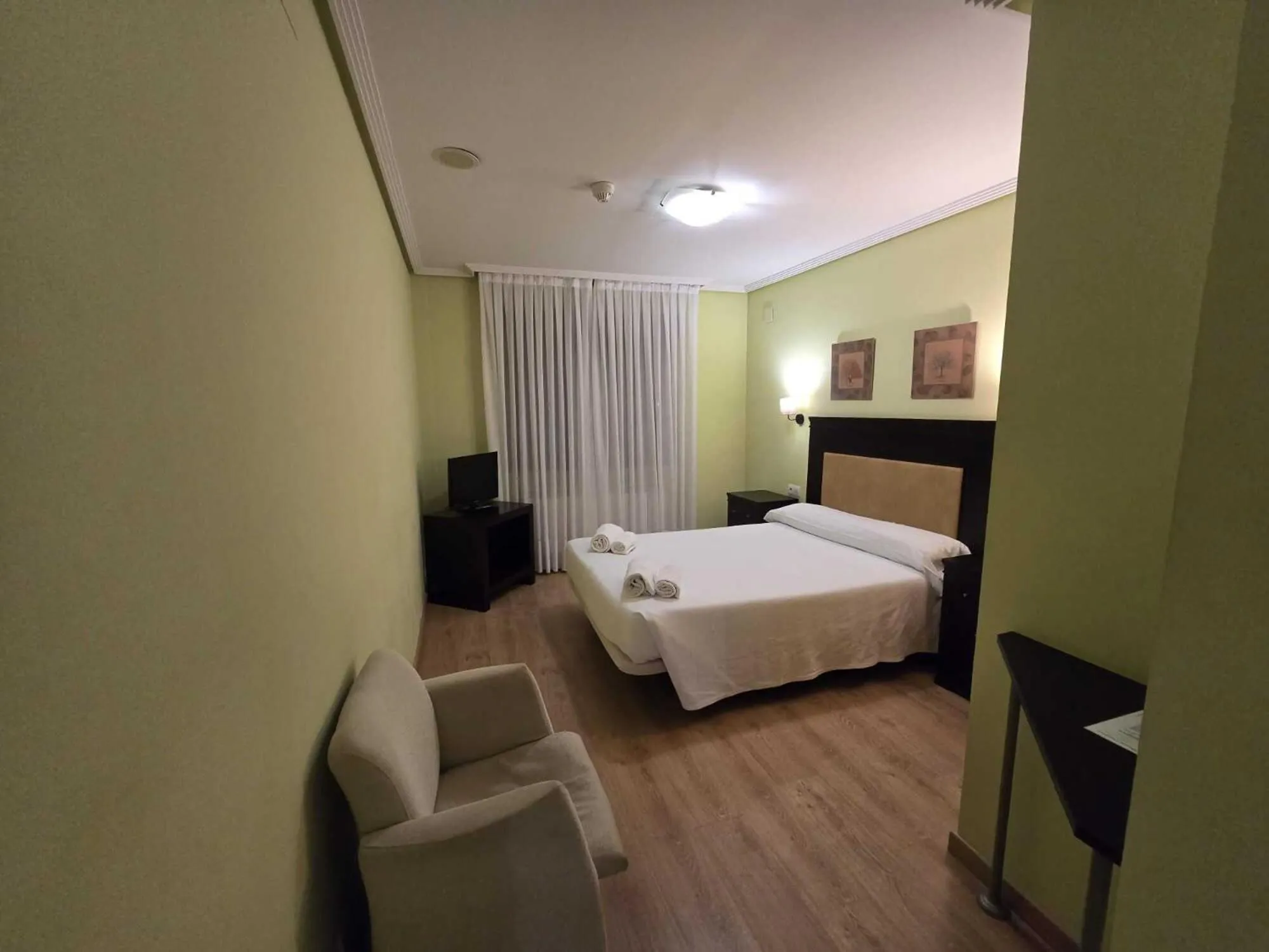 Bed in HOTEL EL ROBLE PALENTINO