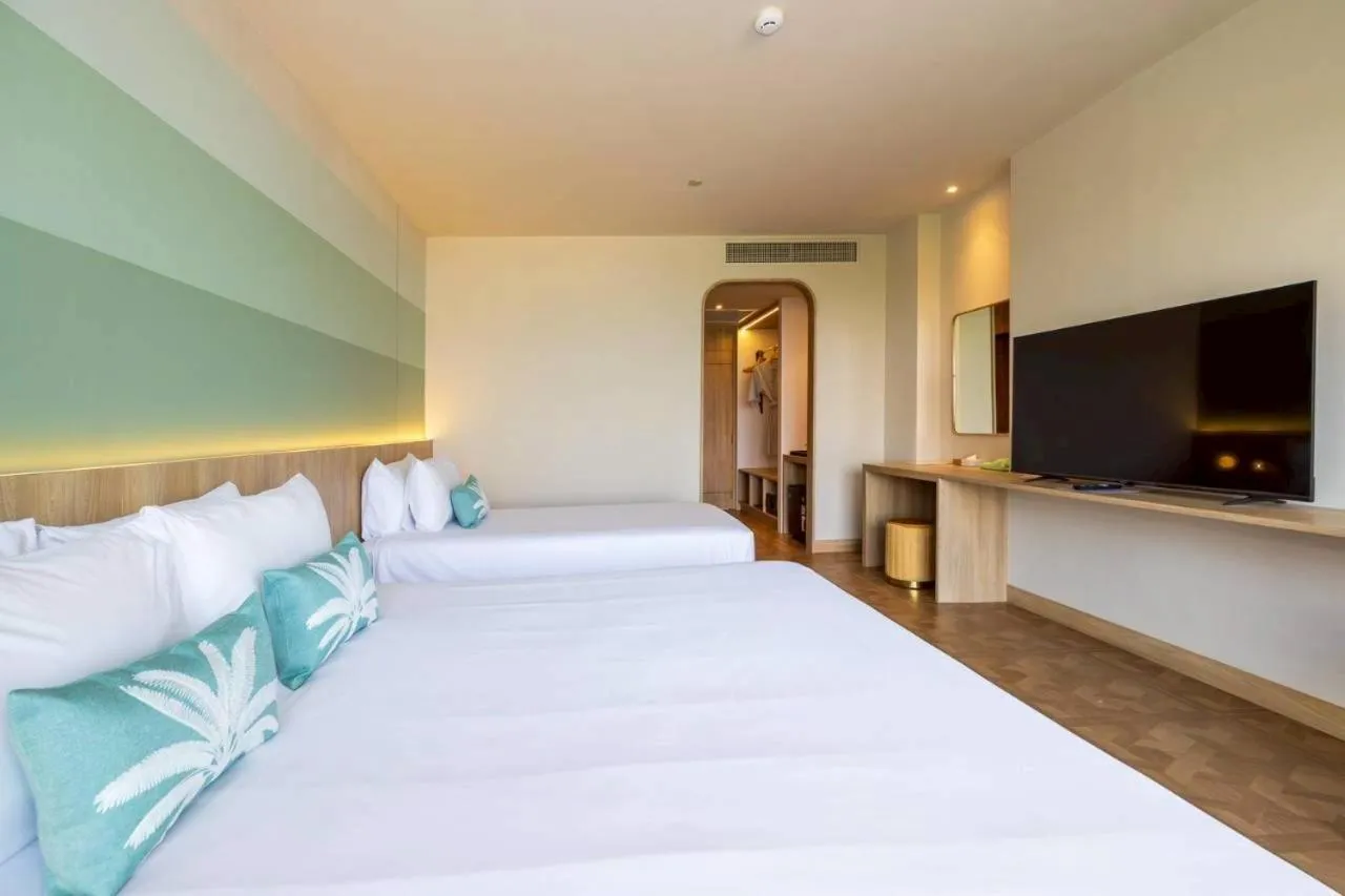 Bed in Garden Sea View Resort