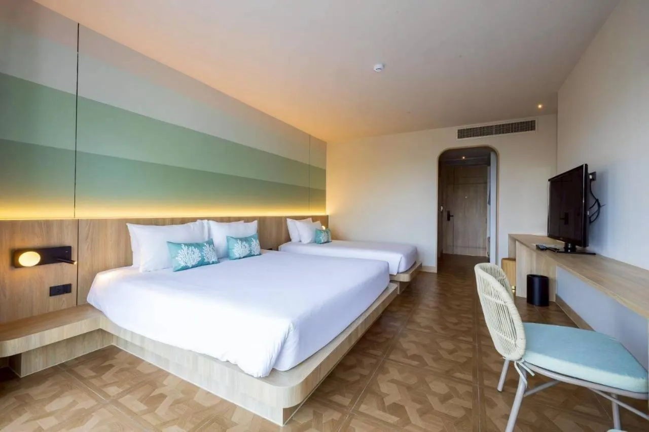 Bed in Garden Sea View Resort