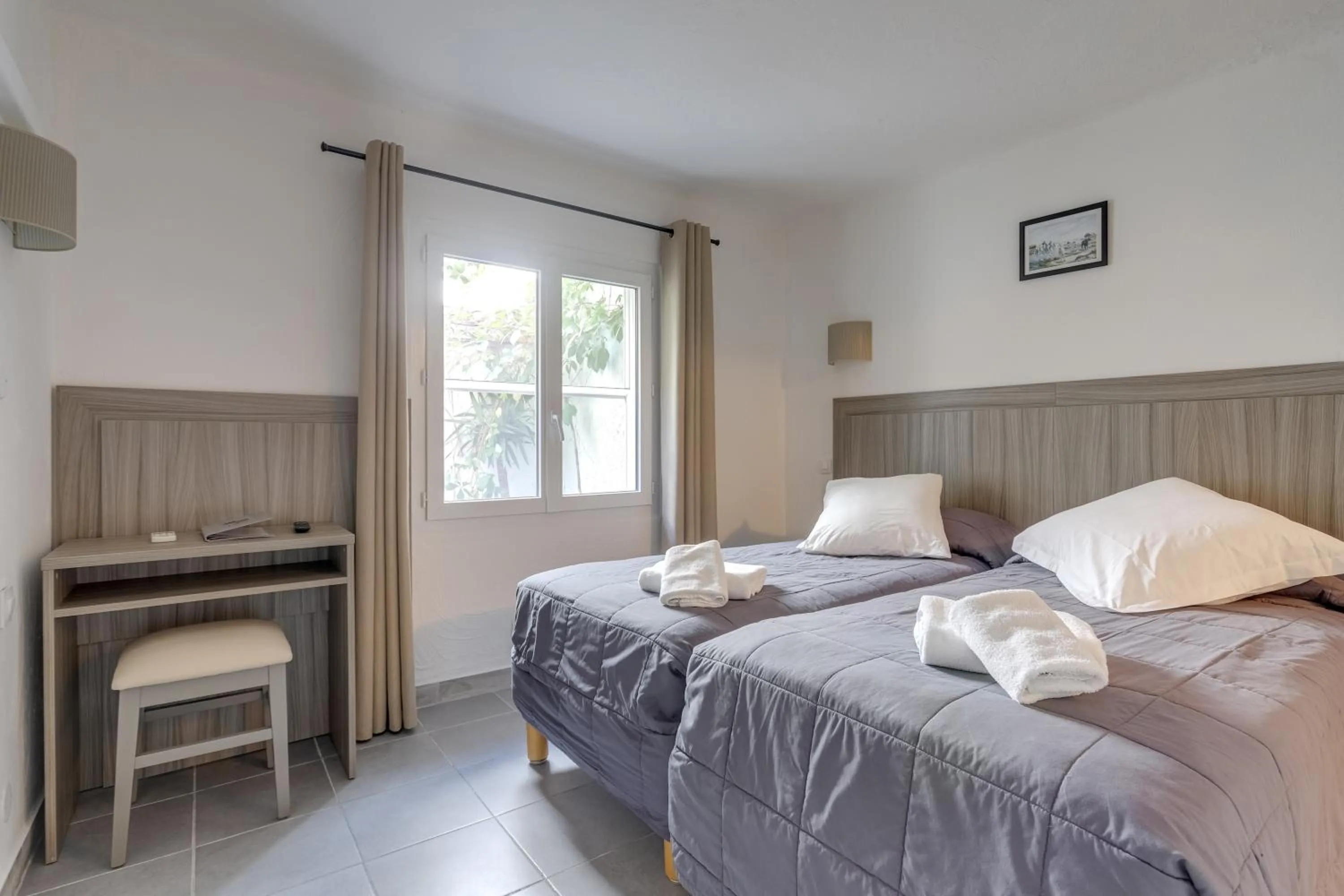 Bed in Hotel Les Palmiers En Camargue