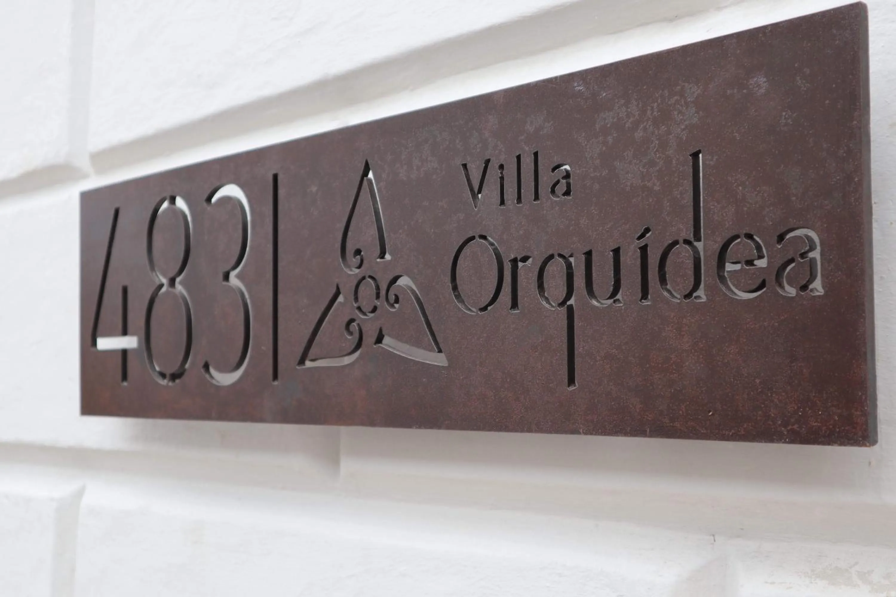 Property logo or sign in Villa Orquídea Boutique Hotel