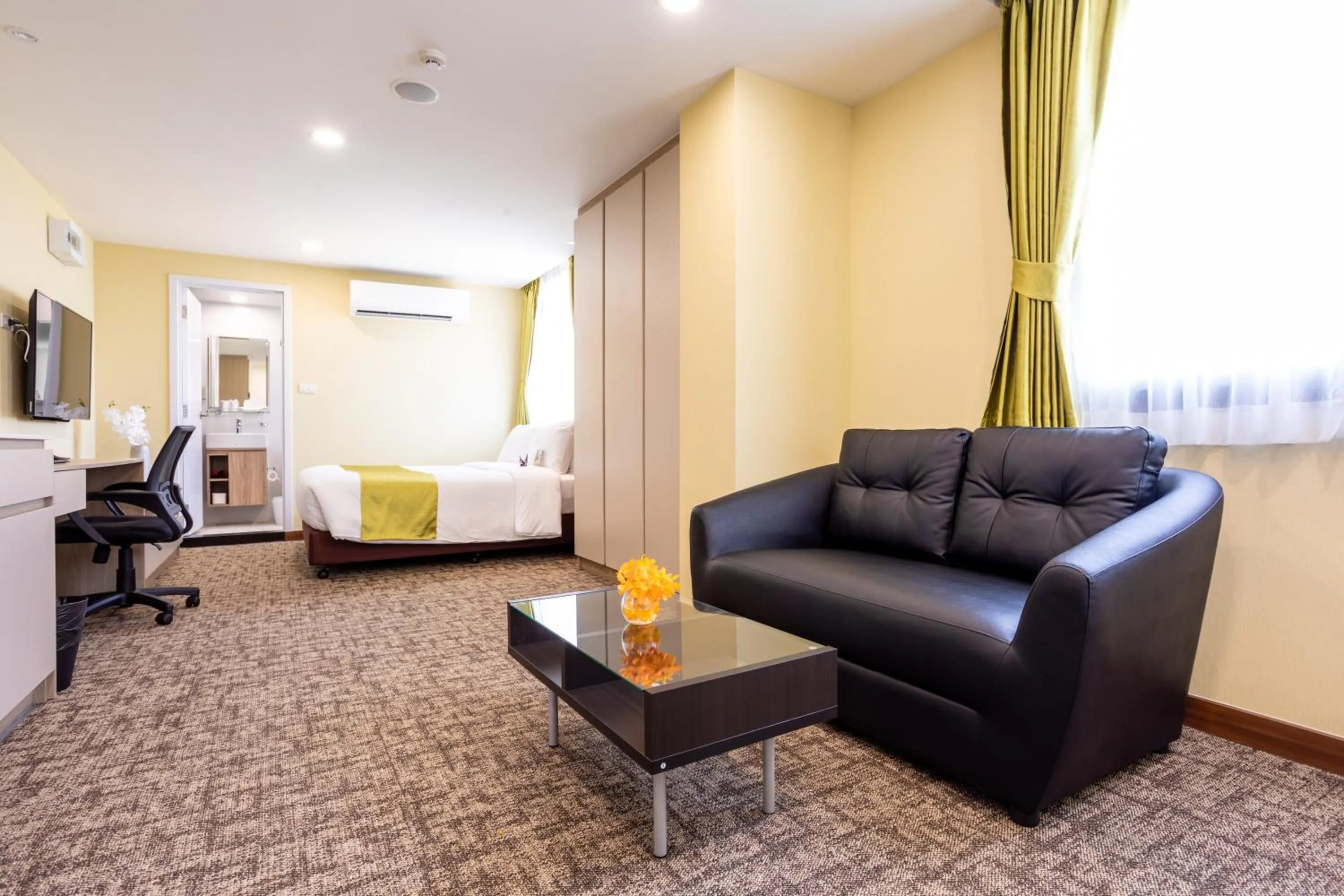 Seating area, Bed in Hotel Kuretakeso Thailand Sriracha - SHA Extra Plus