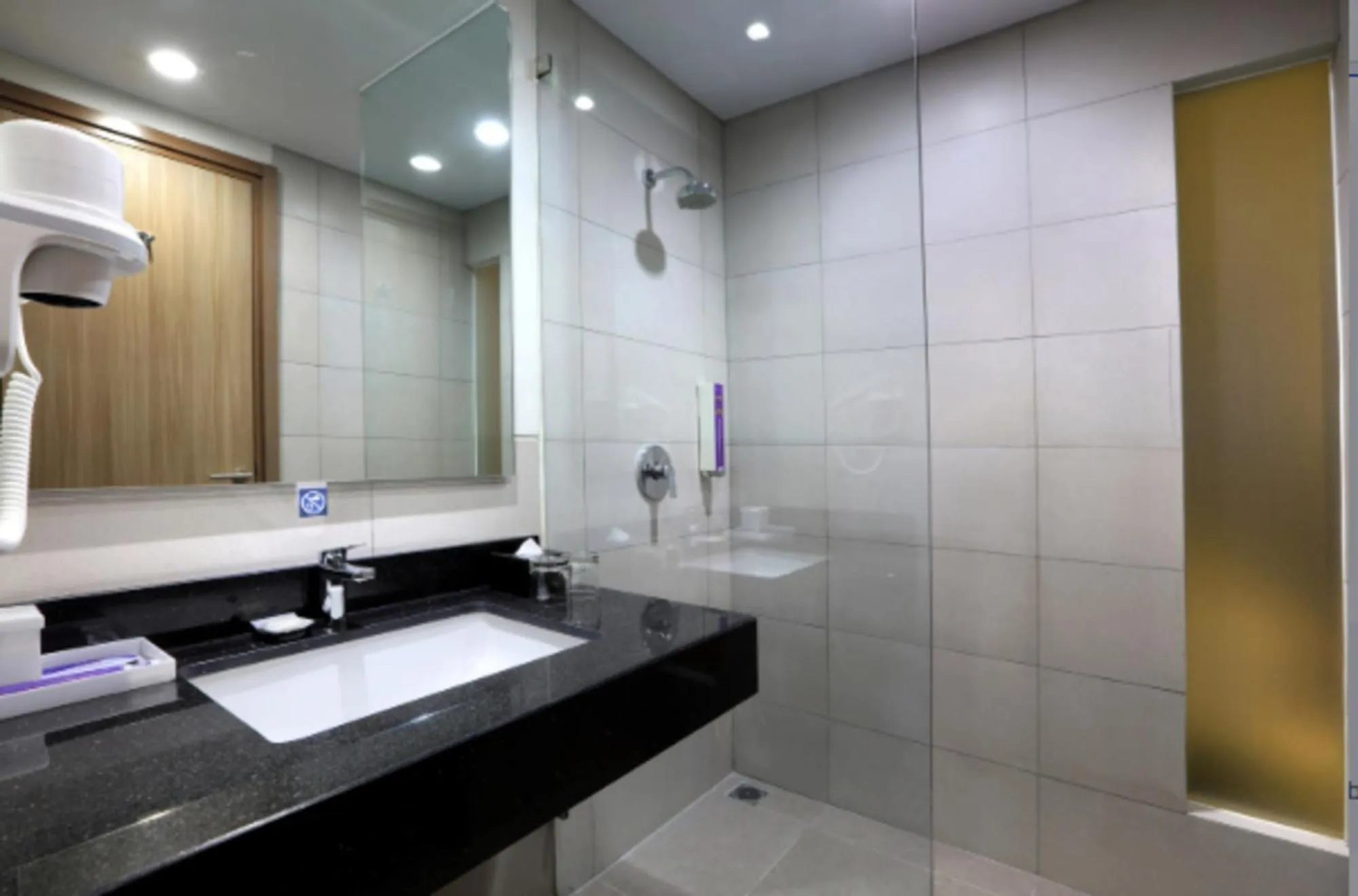 Bathroom in Quest Prime Cikarang by ASTON
