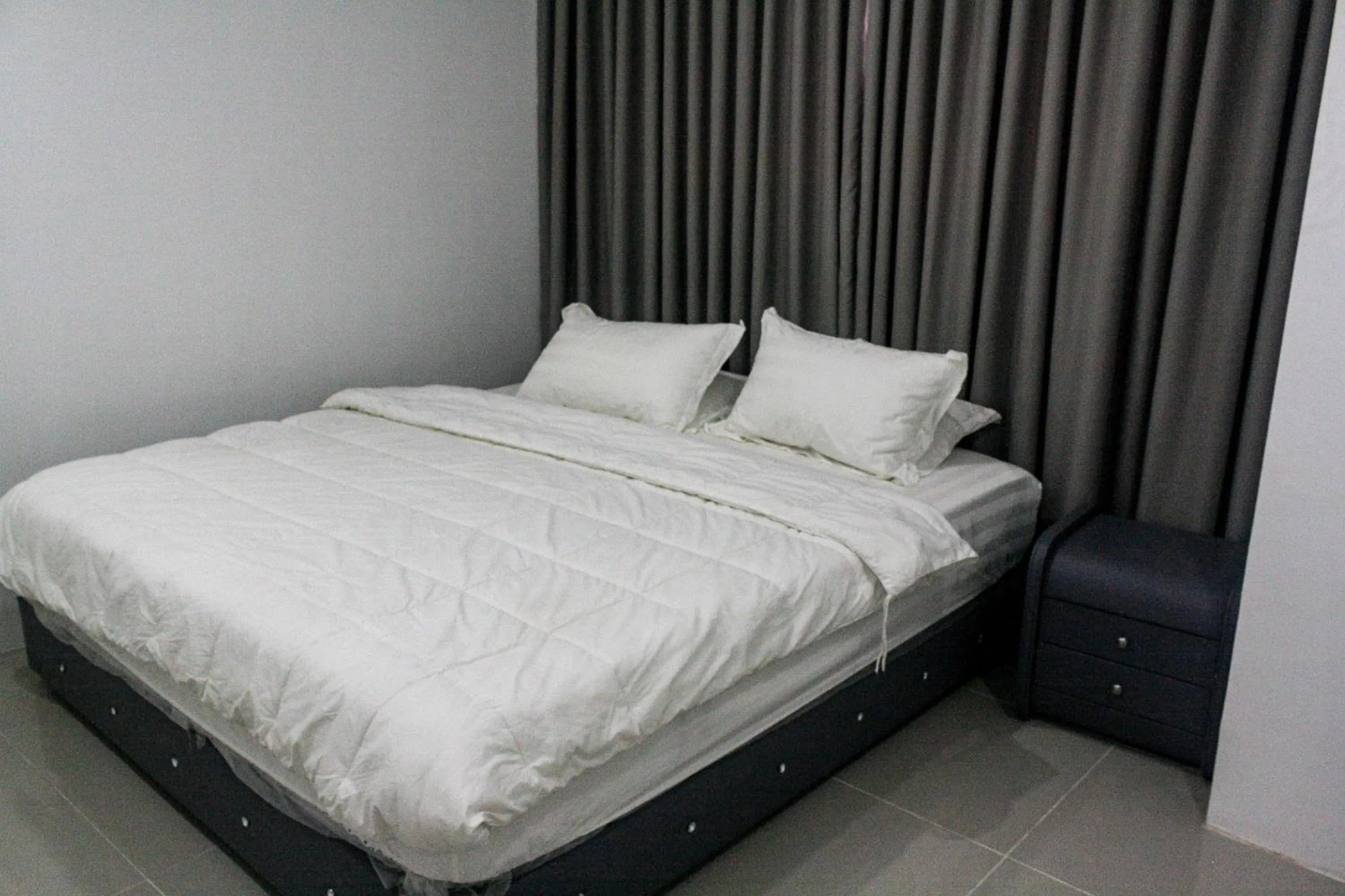 Bed in Chequers Suites Subic Bay