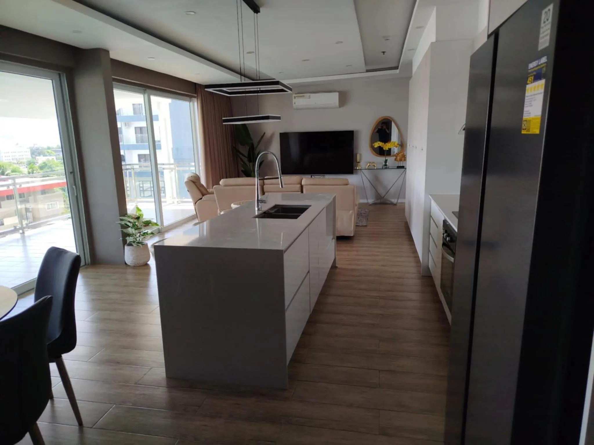 Kitchen or kitchenette in Chequers Suites Subic Bay