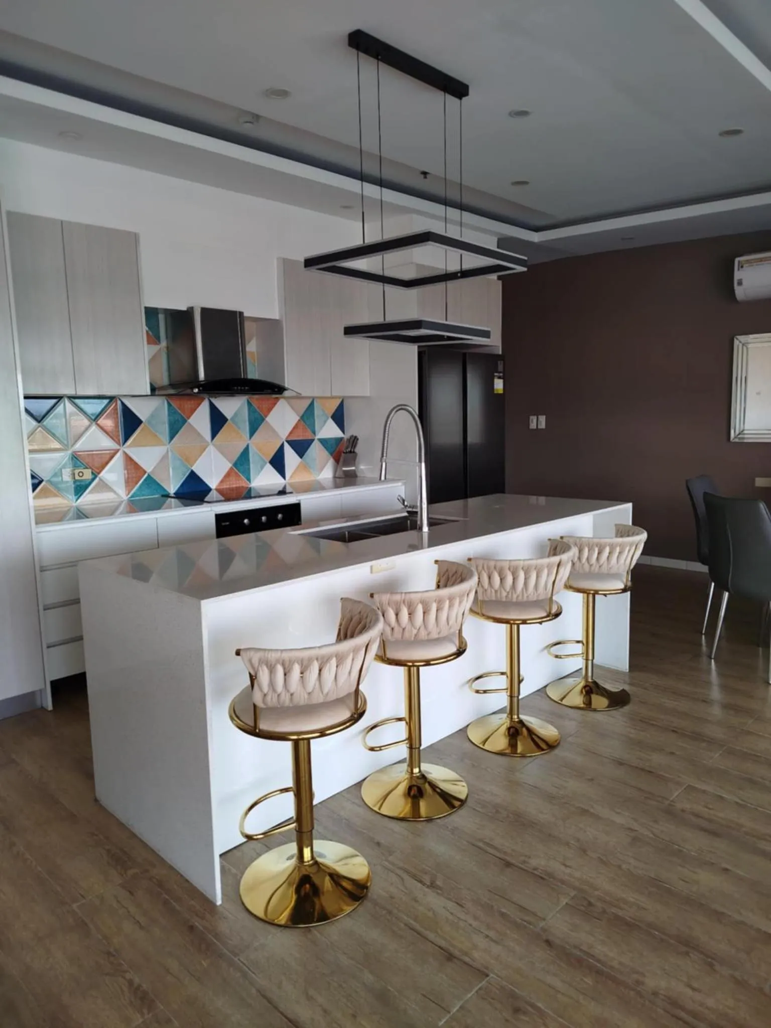Kitchen or kitchenette in Chequers Suites Subic Bay