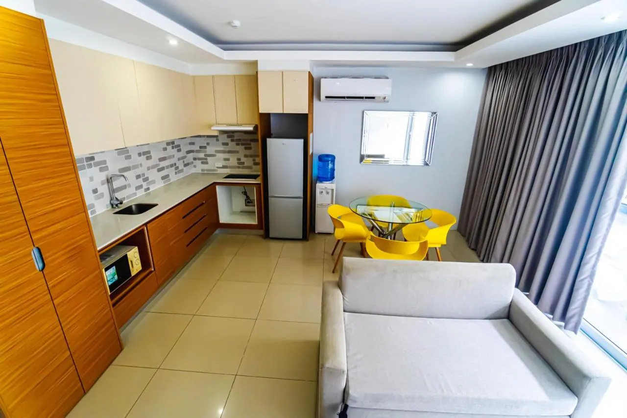 Kitchen or kitchenette in Chequers Suites Subic Bay