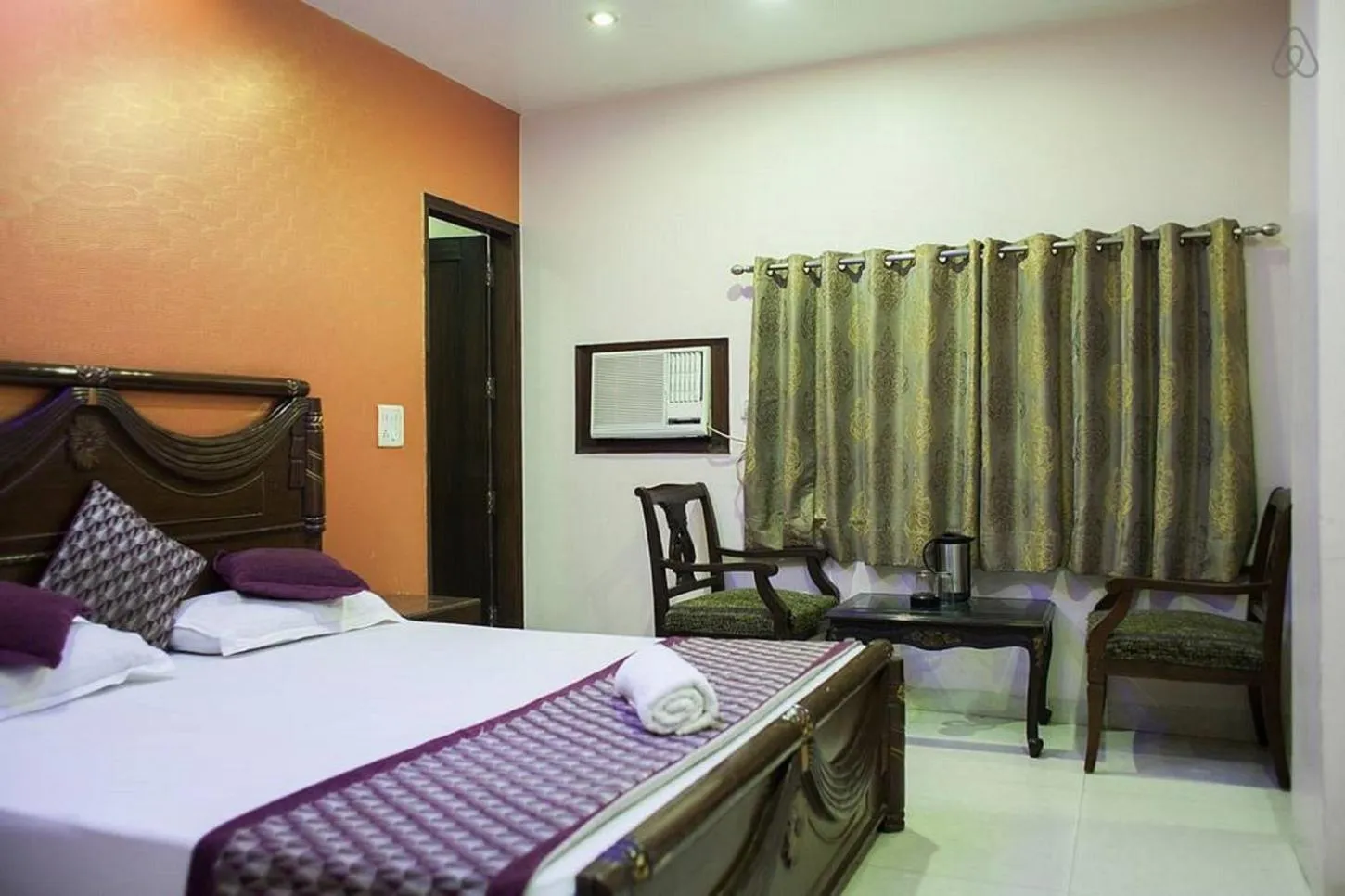 Decorative detail, Bed in Amax Inn