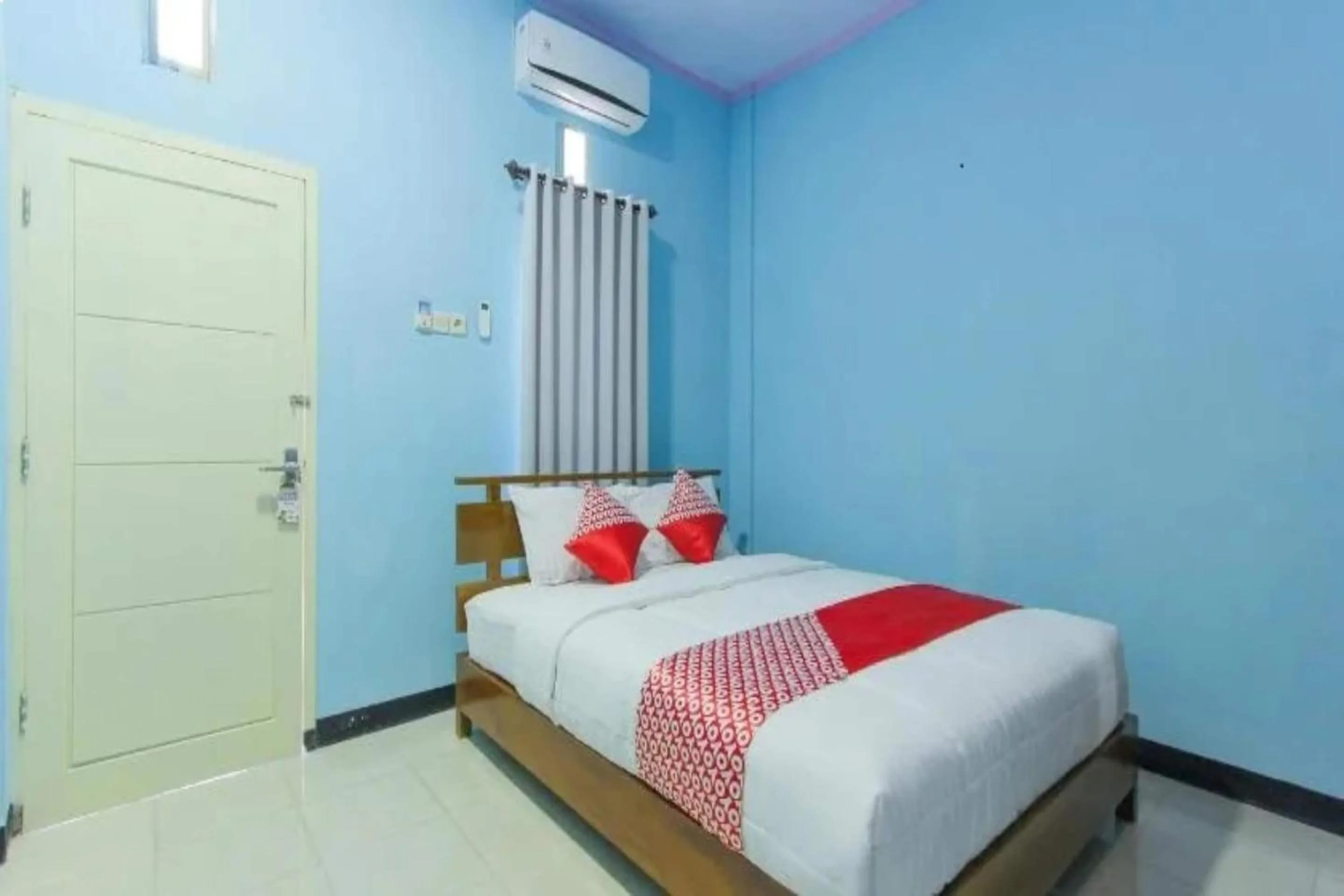 Bedroom in Hotel O Asipra House