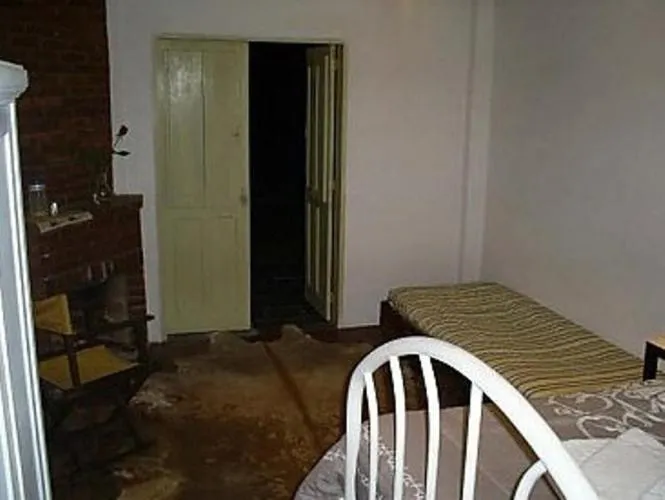 Bed in Pousada Chácara das Roseiras