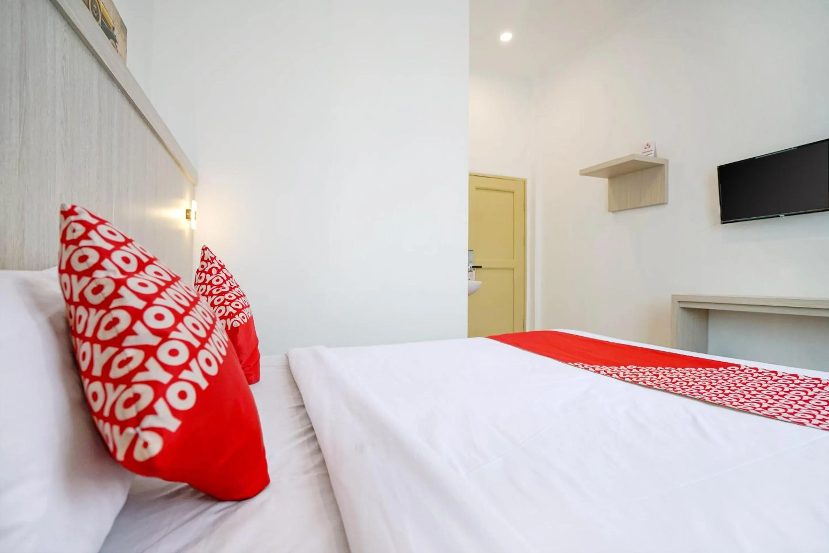 Bedroom in OYO Life 1299 Balcony Orange Homestay