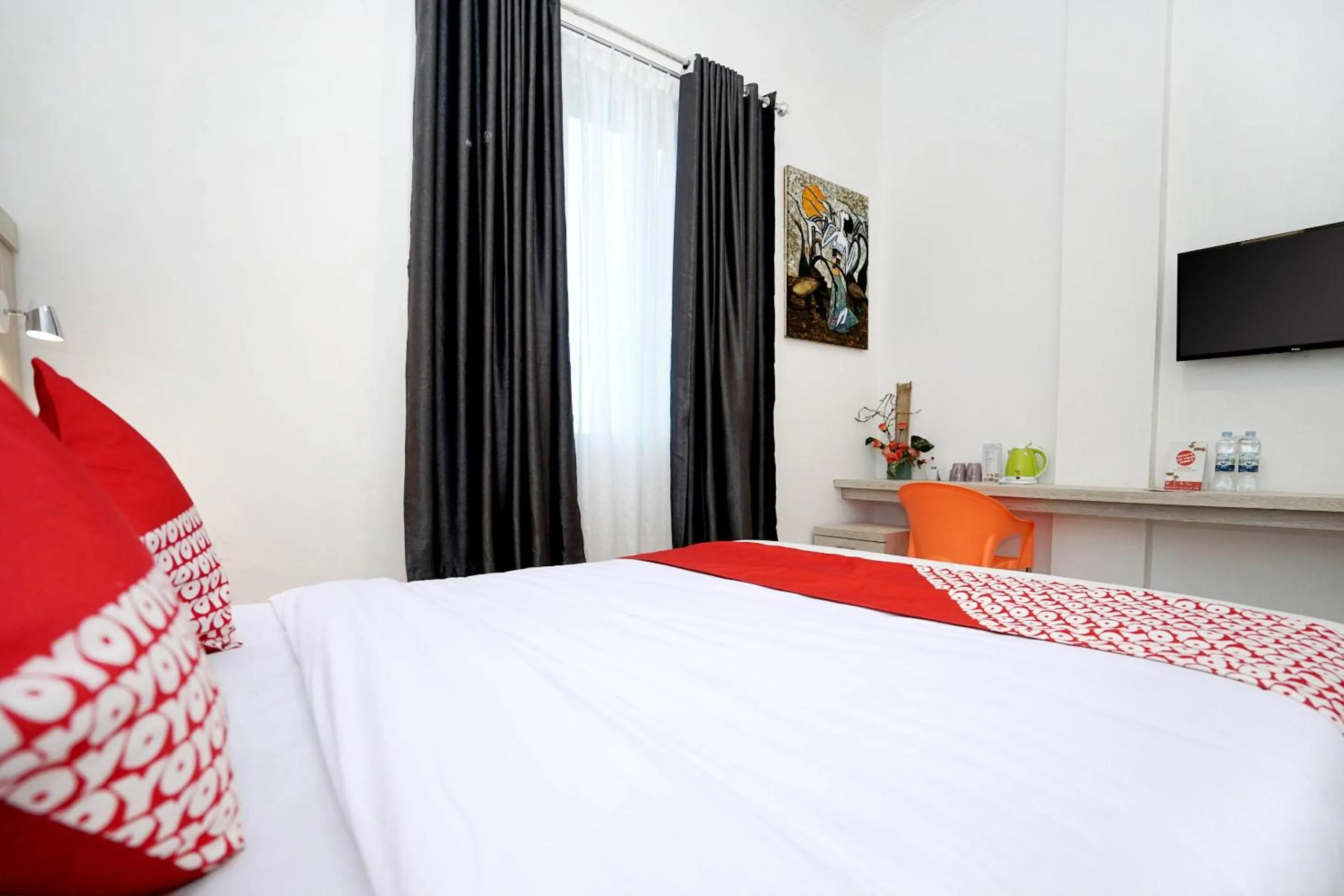 Bedroom in OYO Life 1299 Balcony Orange Homestay