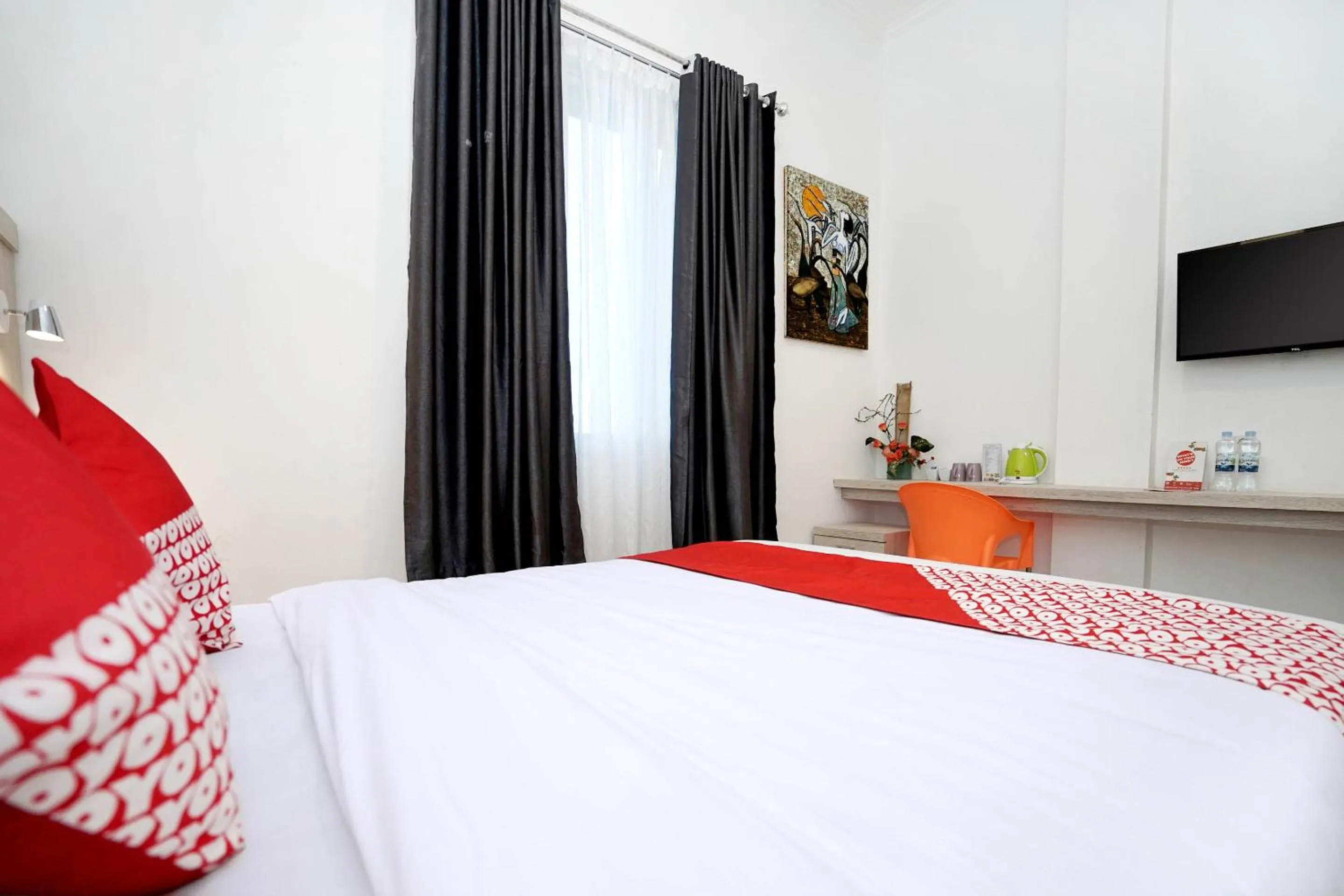 Bedroom in OYO Life 1299 Balcony Orange Homestay