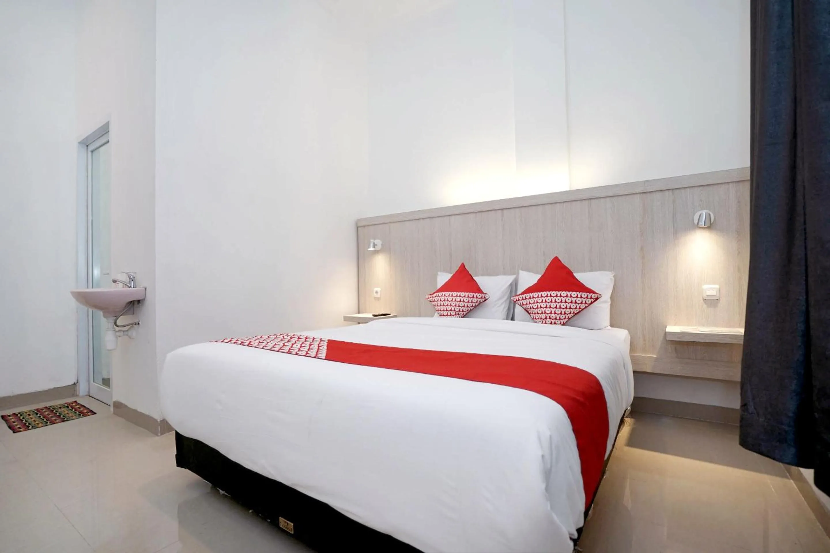 Bedroom in OYO Life 1299 Balcony Orange Homestay