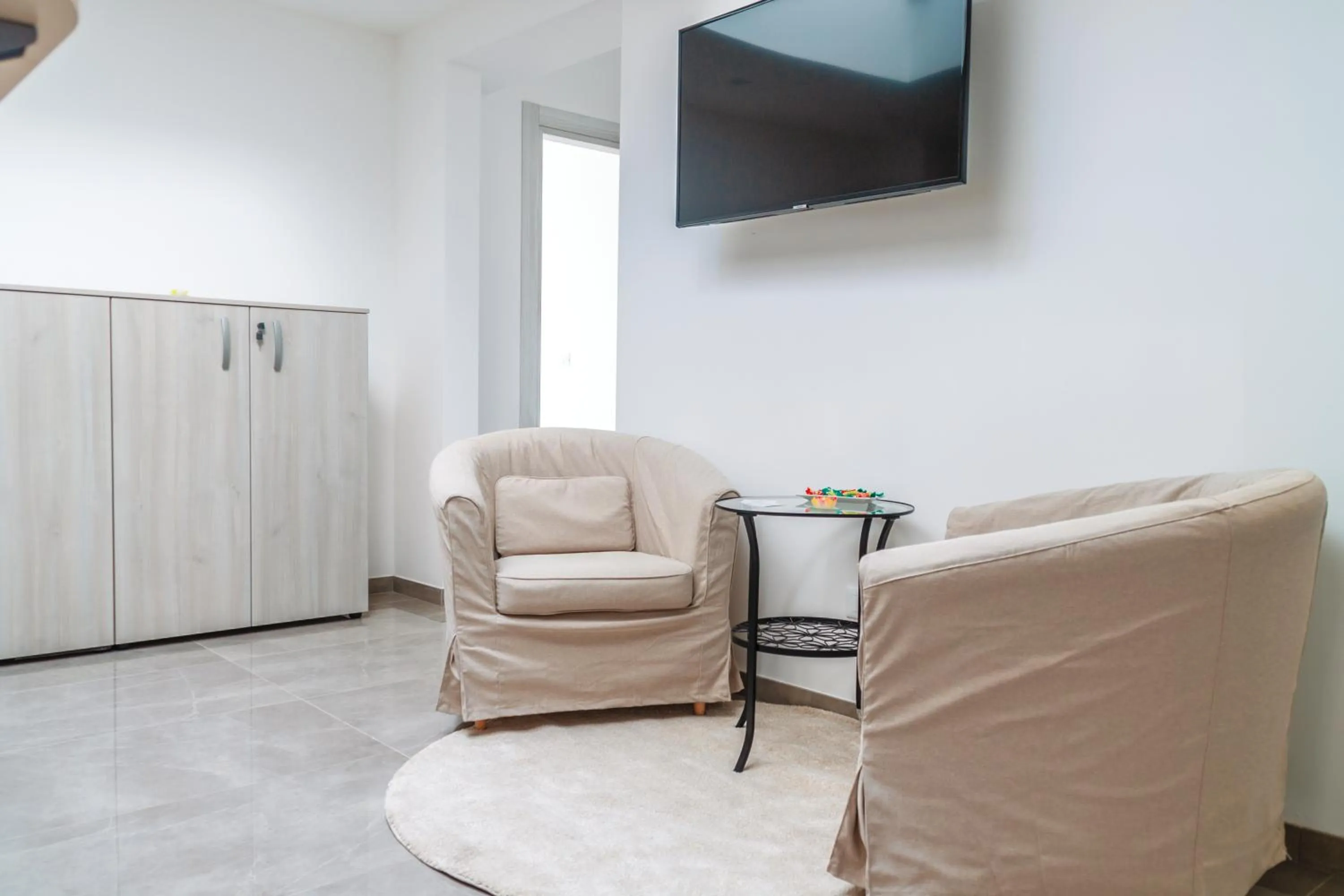 Communal lounge/ TV room in Mediterraneo Palace Luxury Affittacamere