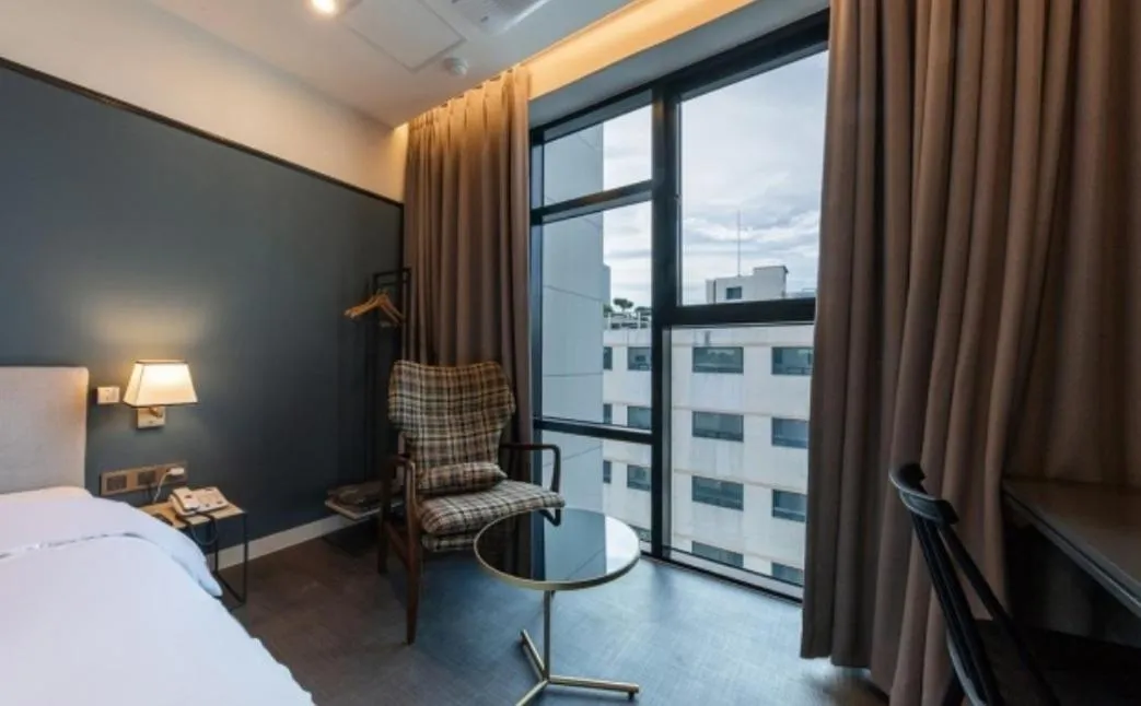 Bed in Brown Dot Hotel Deokcheon