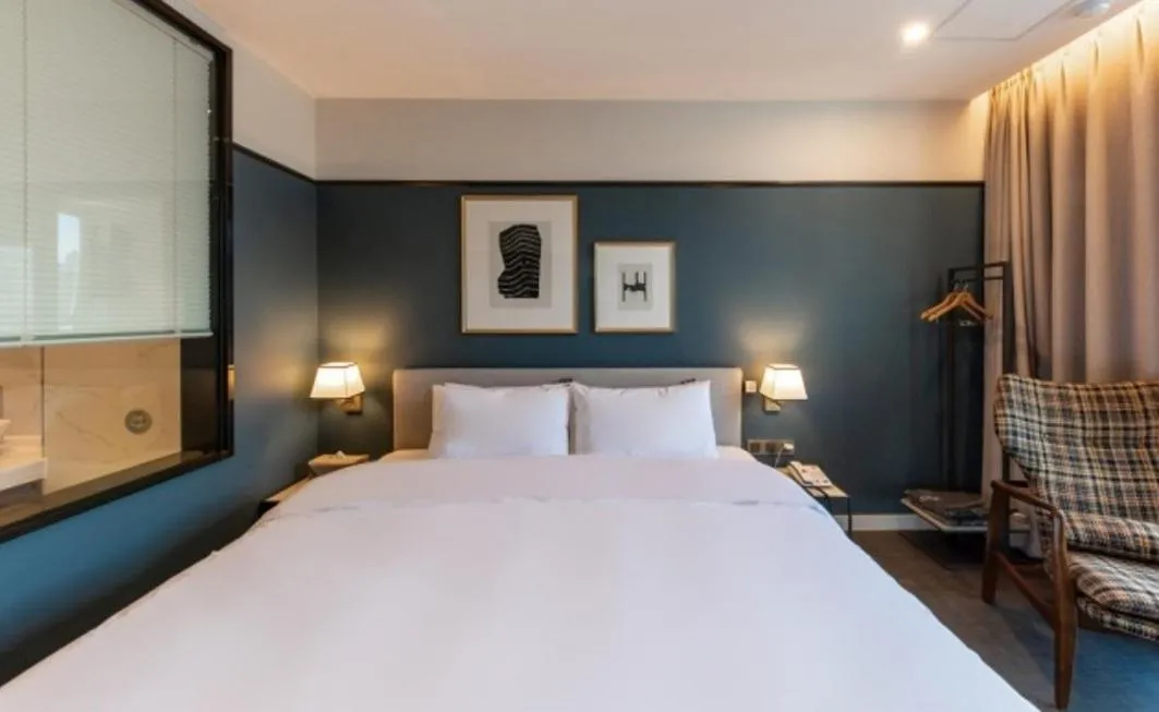 Bed in Brown Dot Hotel Deokcheon