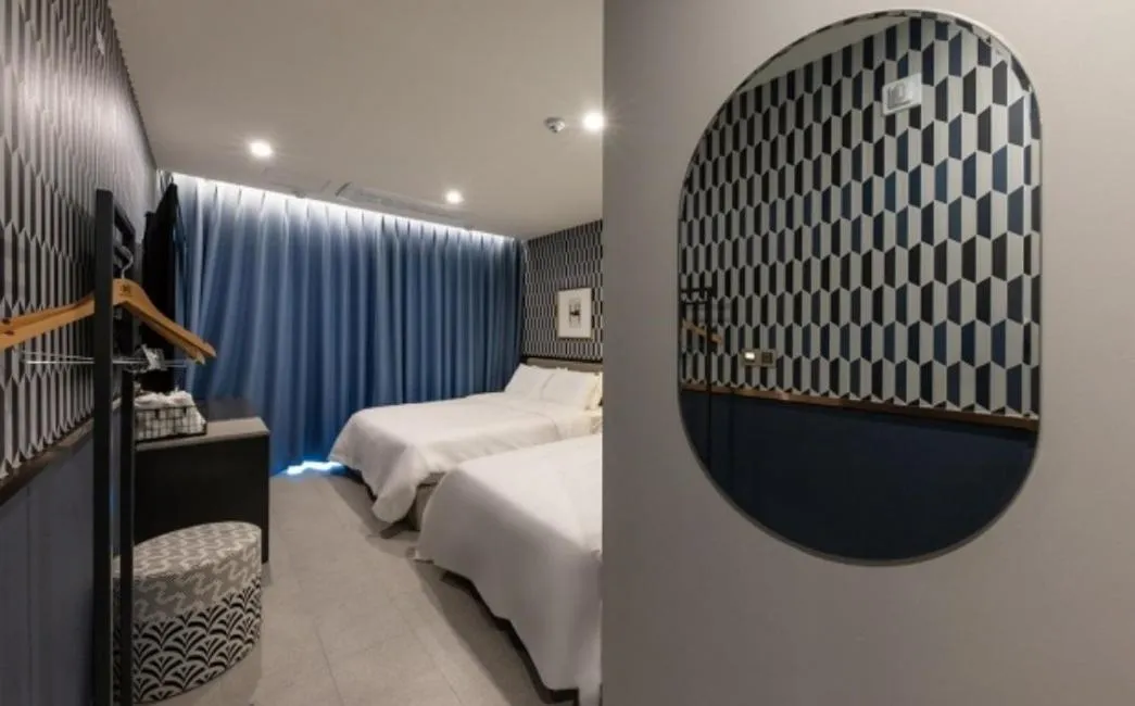 Bed in Brown Dot Hotel Deokcheon