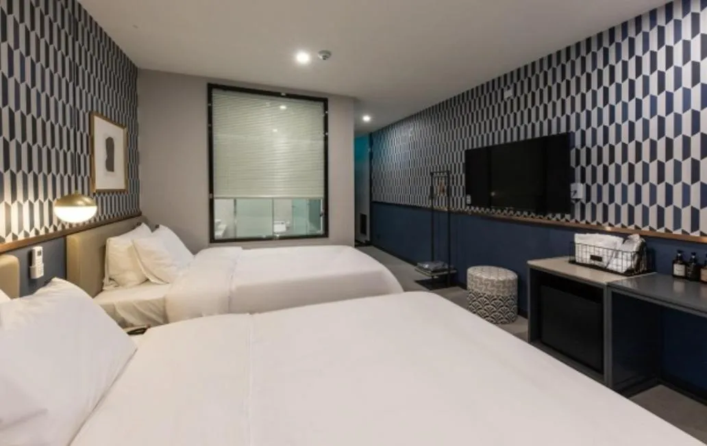 Bed in Brown Dot Hotel Deokcheon