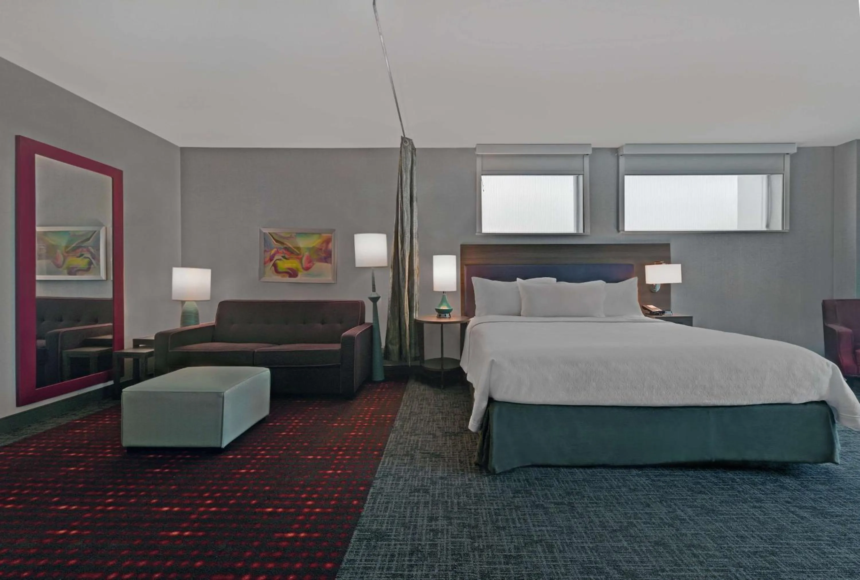 Living room, Bed in Home2 Suites By Hilton Memphis Wolfchase Galleria