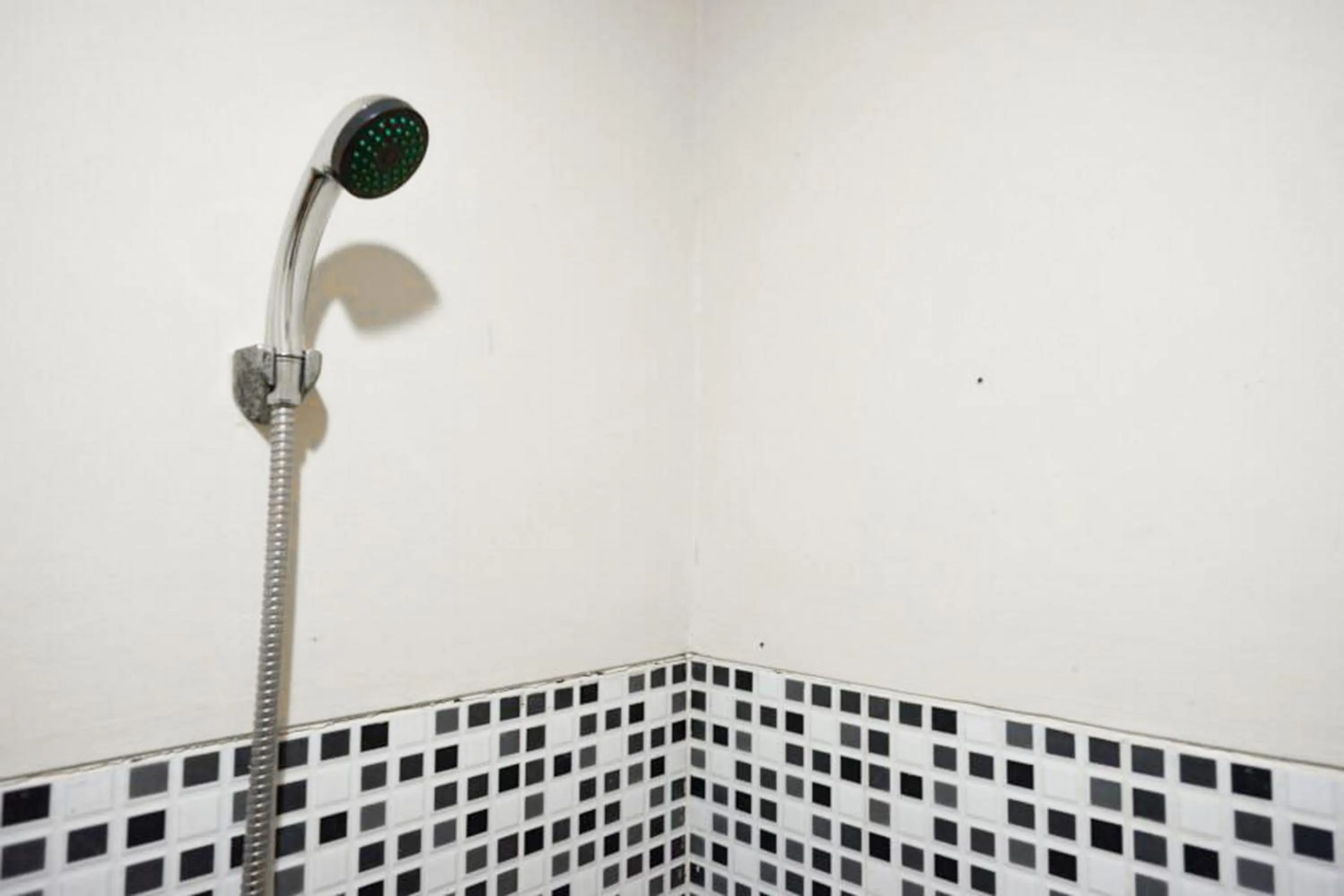 Bathroom in RedDoorz near GOR Wisanggeni