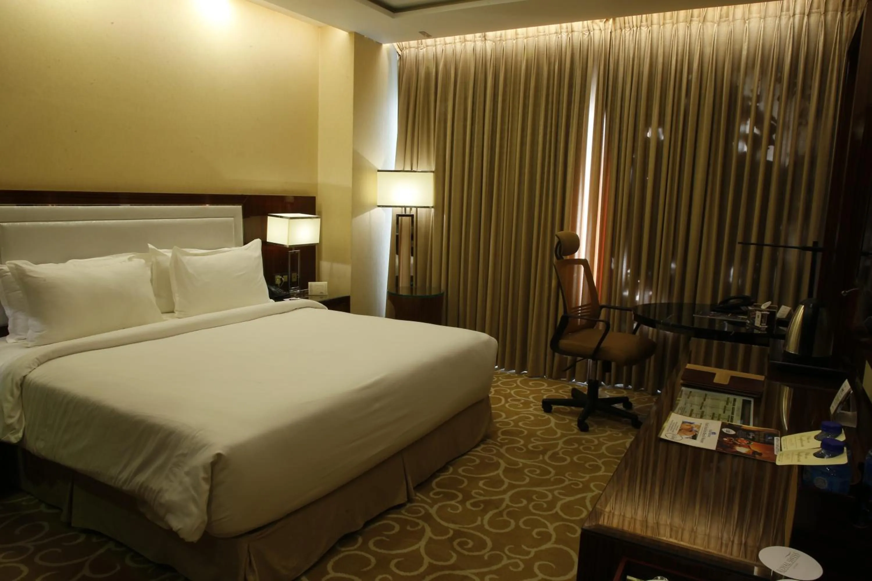 Bed in Royal Swiss Lahore