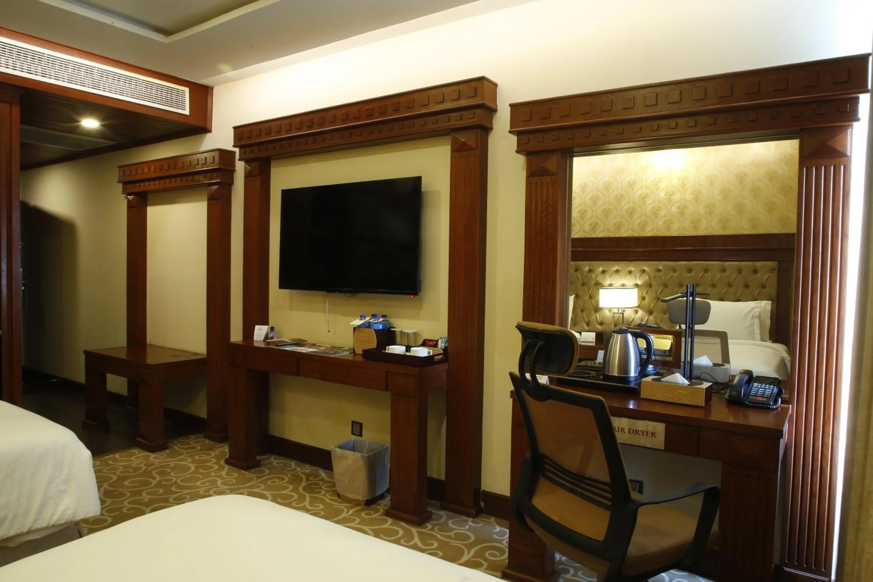 Bed in Royal Swiss Lahore